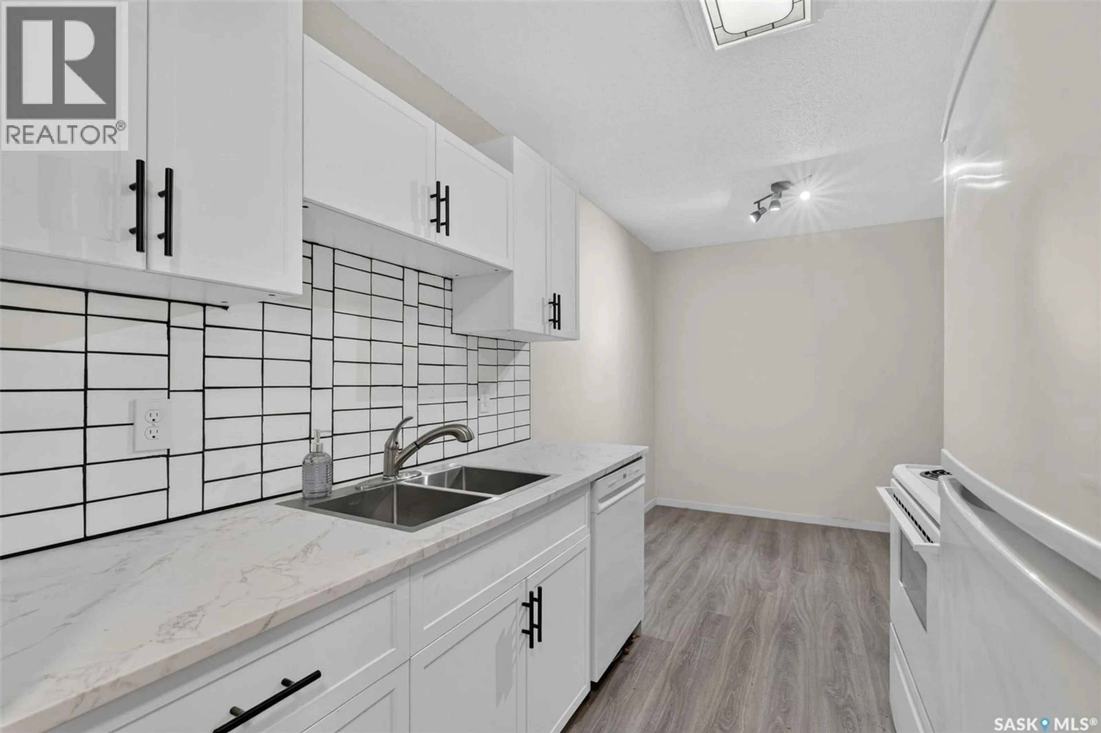 Standard kitchen, ceramic/tile floor for 407 - 1580 OLIVE DIEFENBAKER DRIVE, Prince Albert Saskatchewan S6V7M6
