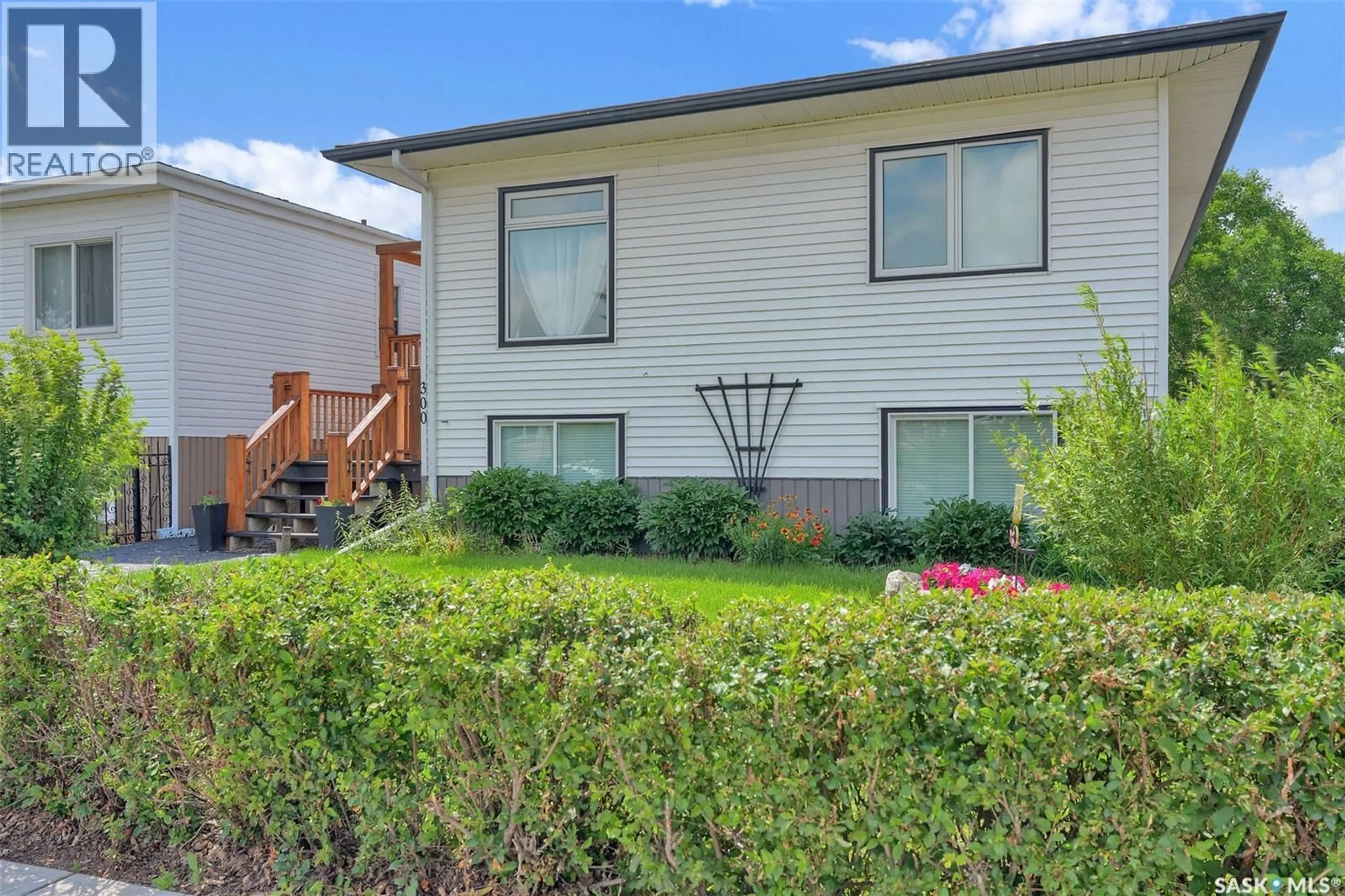 Home with vinyl exterior material, street for 300 MONTREAL STREET, Regina Saskatchewan S4R1L1