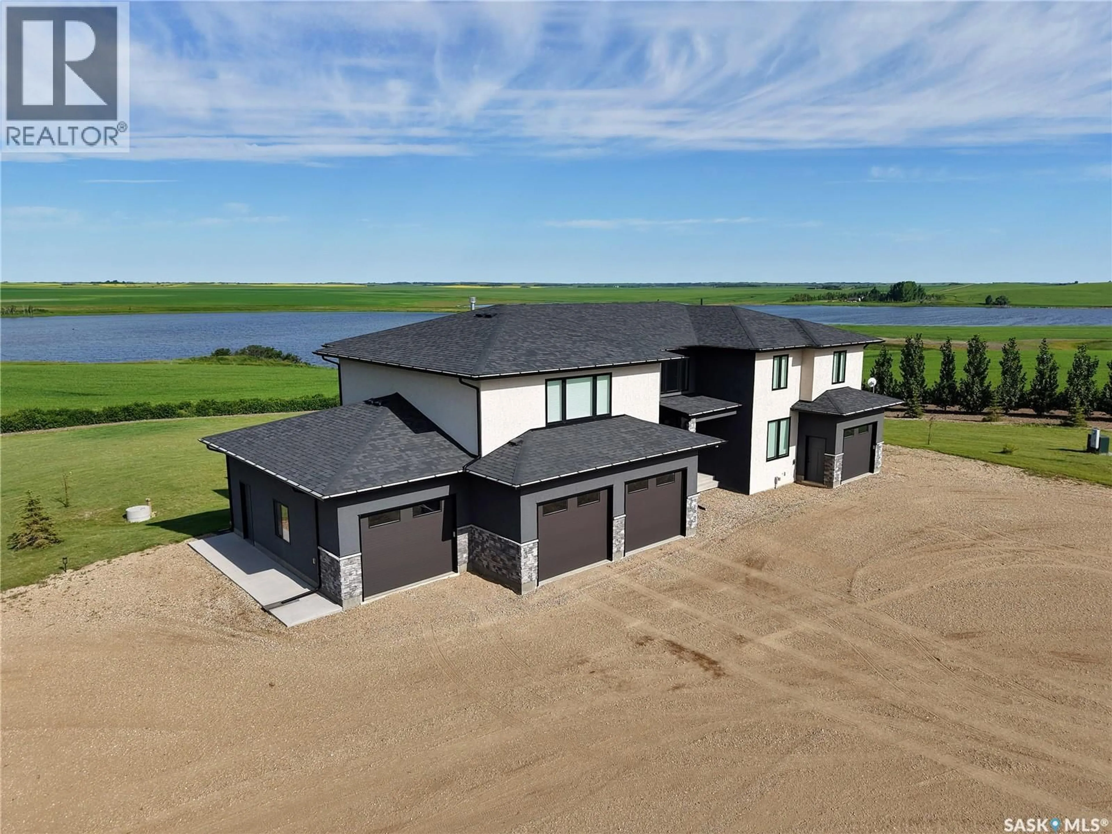 A pic from outside/outdoor area/front of a property/back of a property/a pic from drone, water/lake/river/ocean view for SUNSET SKIES ACREAGE, Grant Rm No. 372 Saskatchewan S0K3W0