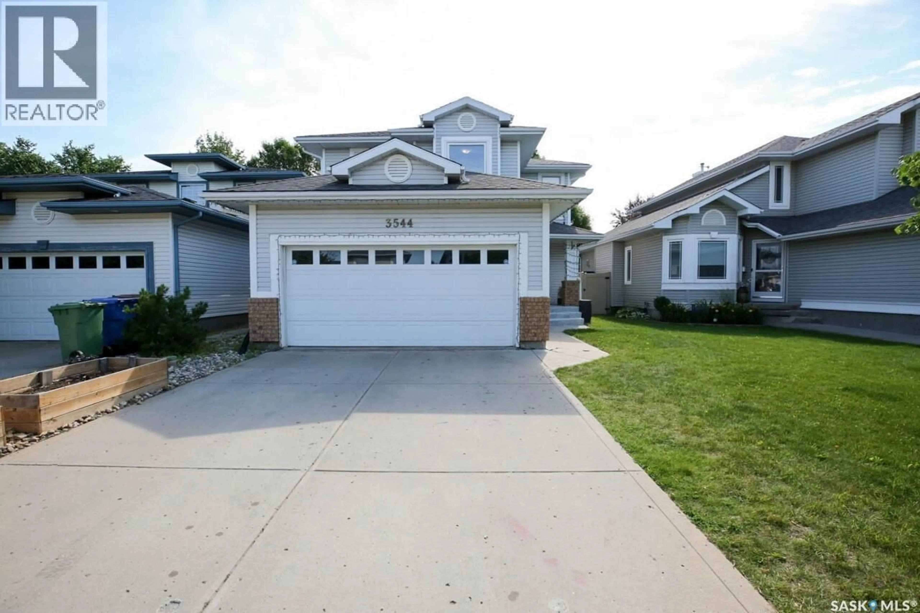 Home with vinyl exterior material, street for 3544 BASSWOOD GROVE, Regina Saskatchewan S4V2T5
