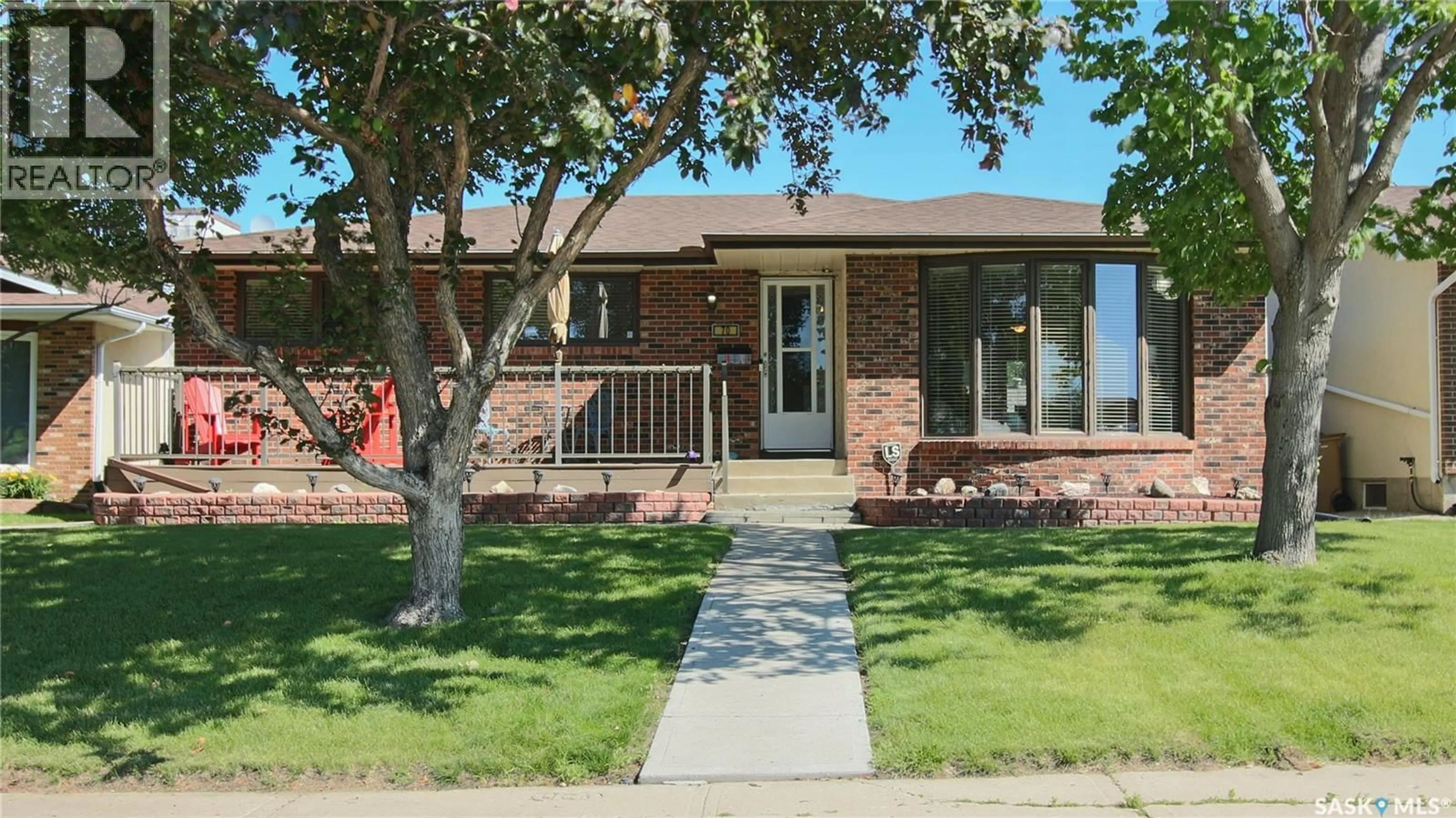 Home with brick exterior material, street for 70 HAWKES AVENUE, Regina Saskatchewan S4X1B4