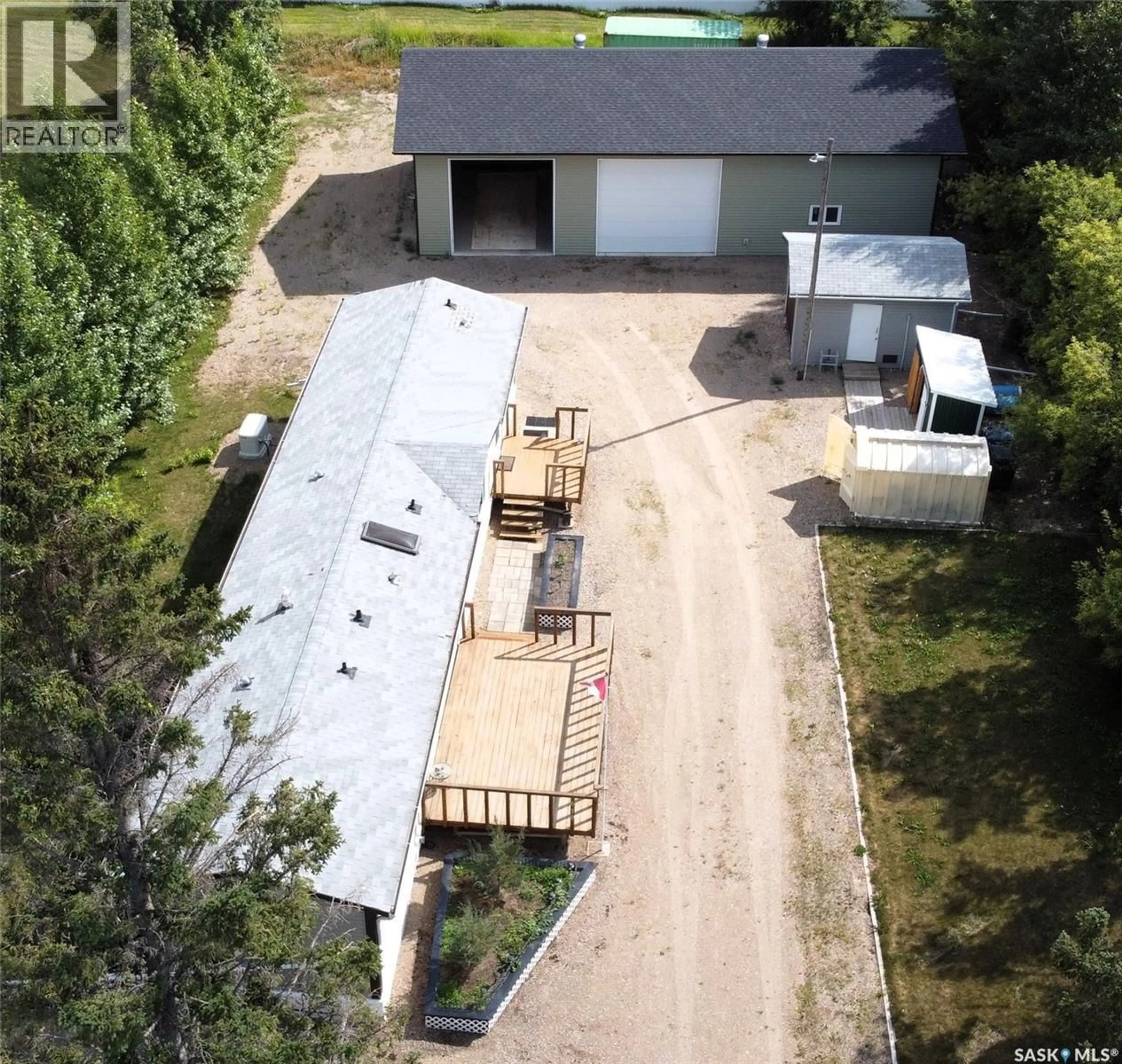 A pic from outside/outdoor area/front of a property/back of a property/a pic from drone, street for 619 1ST AVENUE, Choiceland Saskatchewan S0J0M0