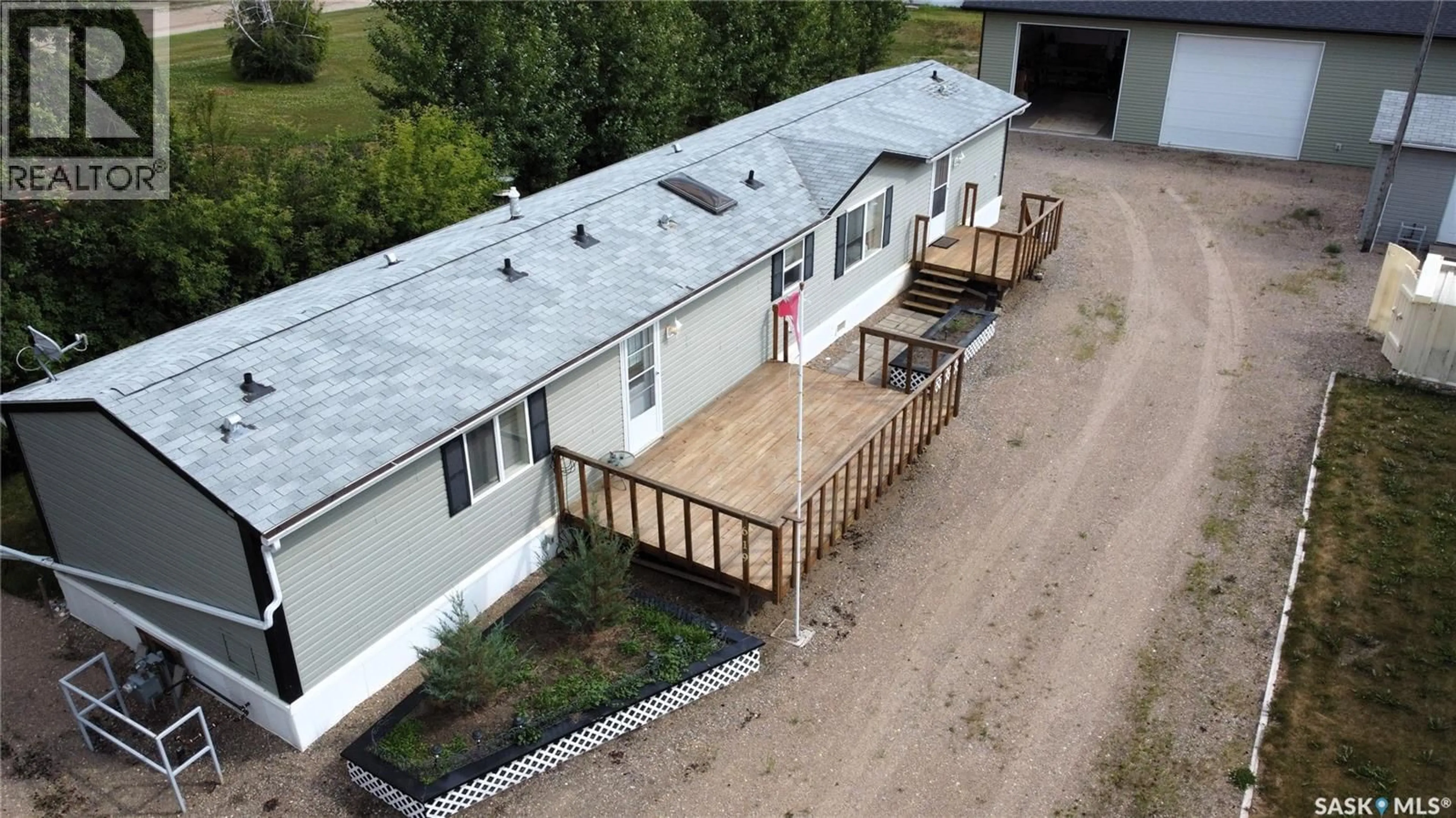 A pic from outside/outdoor area/front of a property/back of a property/a pic from drone, building for 619 1ST AVENUE, Choiceland Saskatchewan S0J0M0