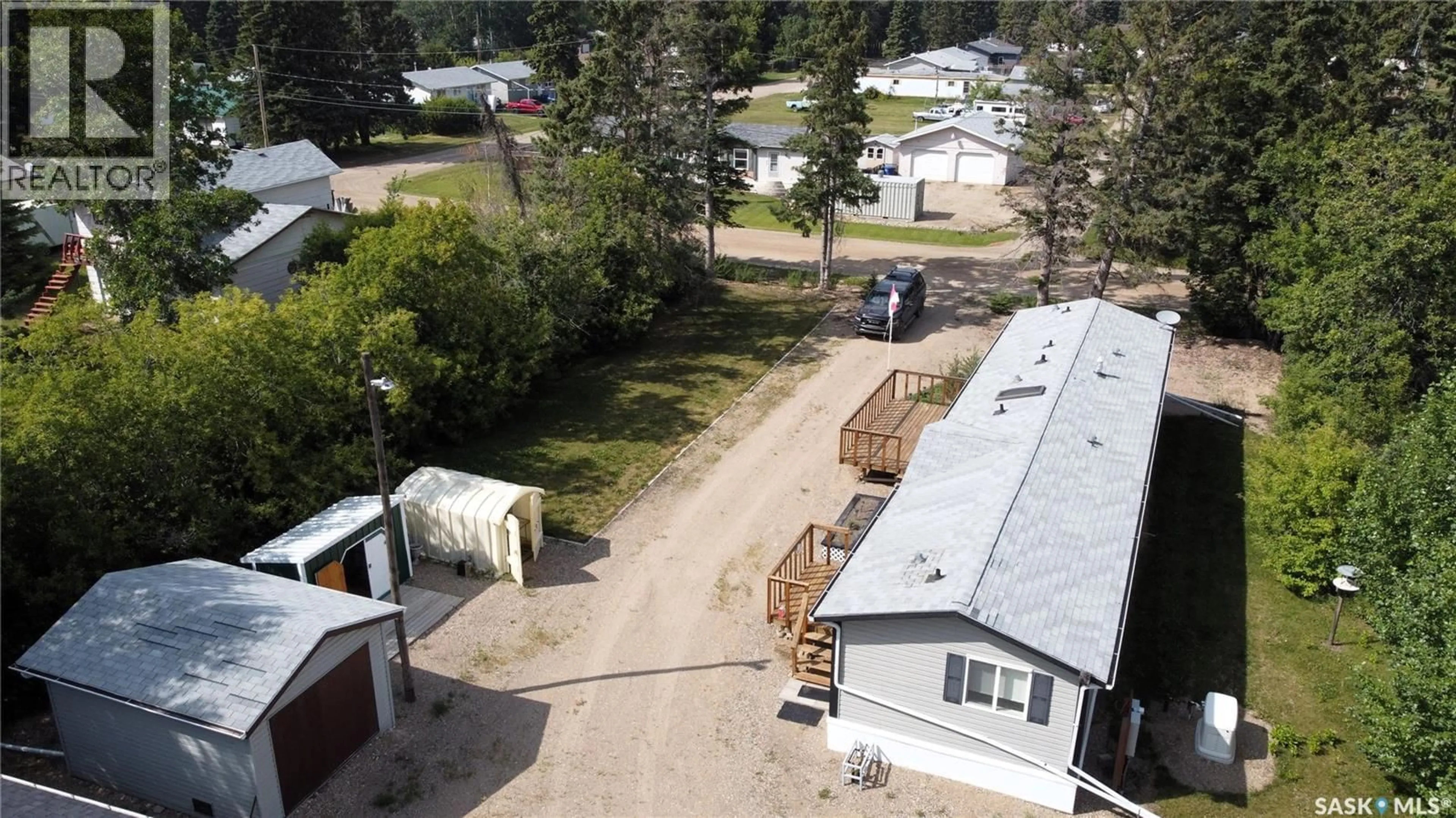 A pic from outside/outdoor area/front of a property/back of a property/a pic from drone, street for 619 1ST AVENUE, Choiceland Saskatchewan S0J0M0