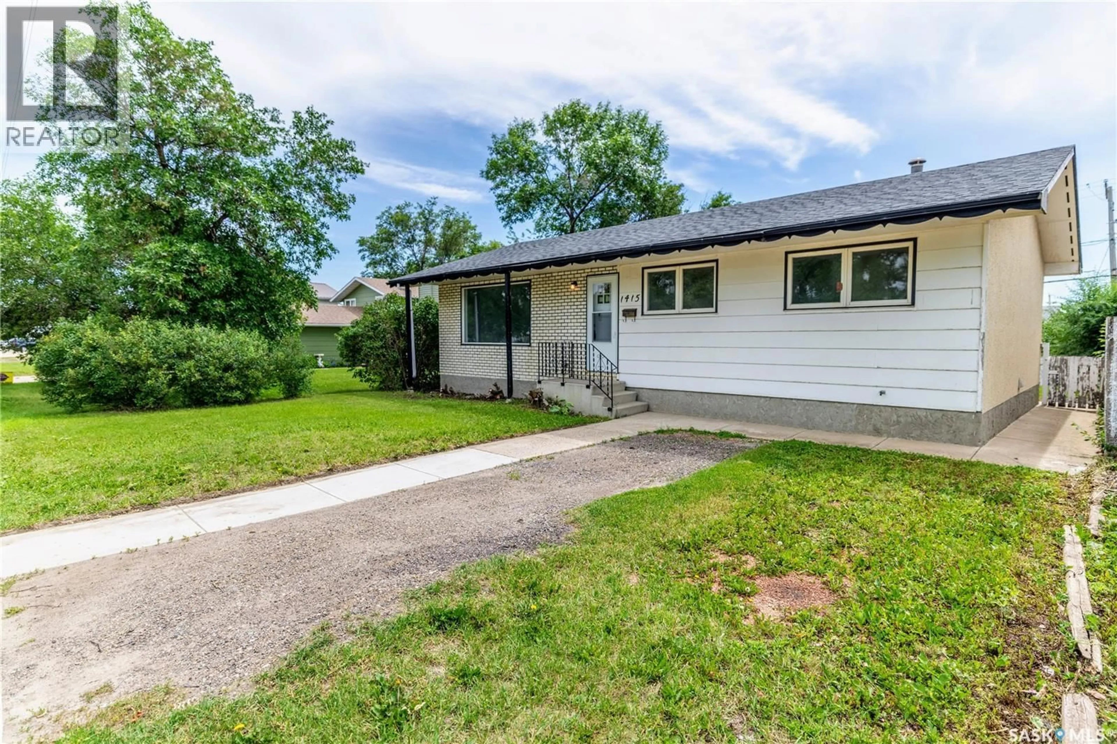 Patio, street for 1415 CARIBOU STREET, Moose Jaw Saskatchewan S6H7M4