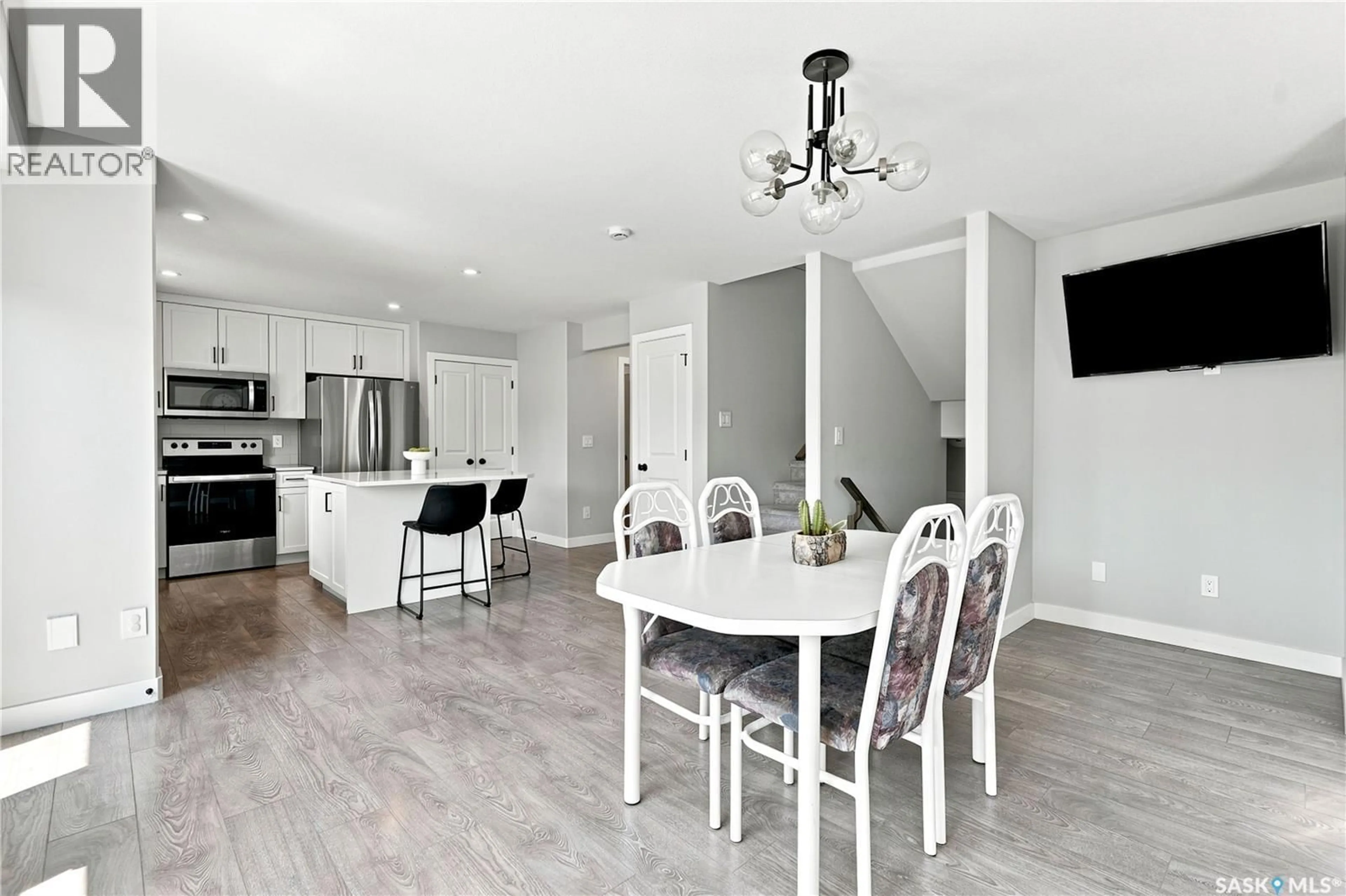Open concept kitchen, ceramic/tile floor for 136 THAKUR STREET, Saskatoon Saskatchewan S7W0Z6