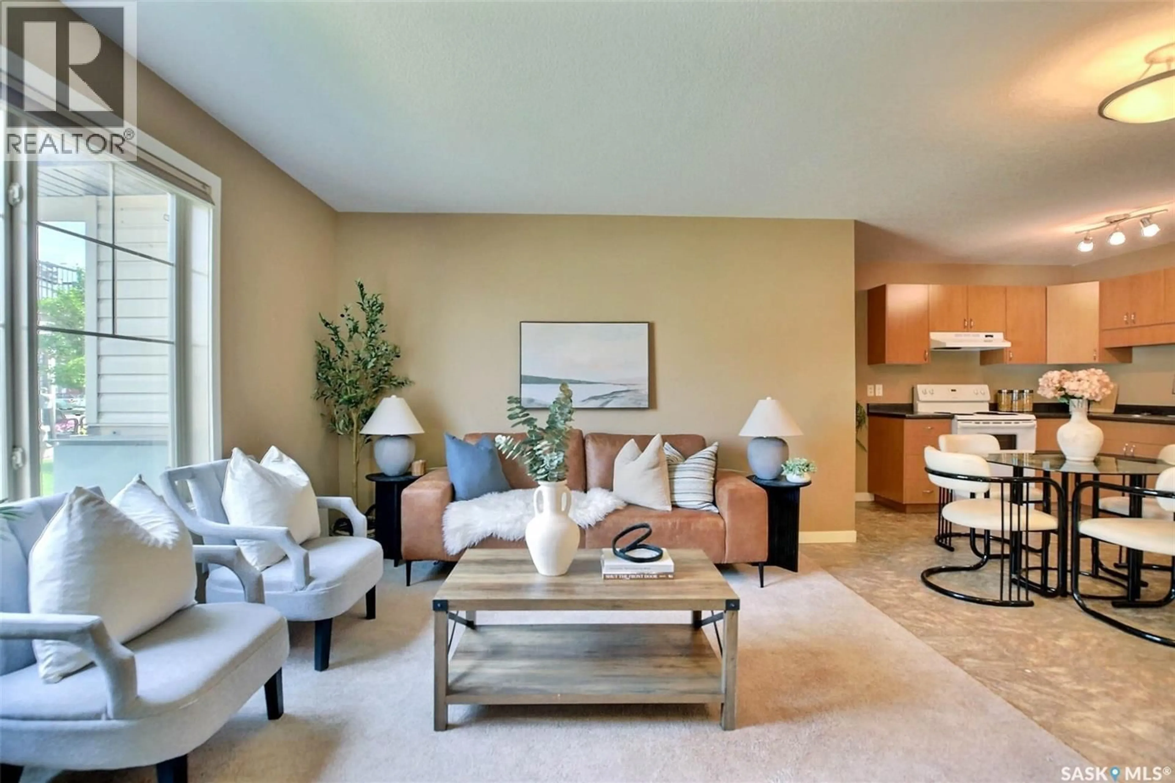 Living room with furniture, carpet floor for 5011 - 10 JAMES HILL ROAD, Regina Saskatchewan S4W0B9