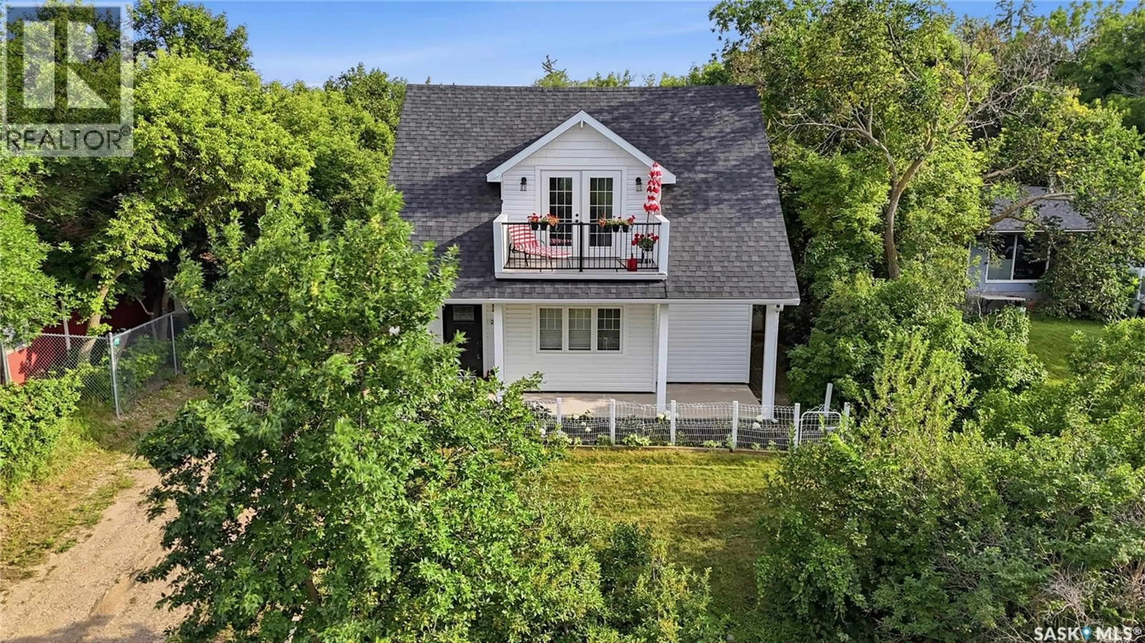 A pic from outside/outdoor area/front of a property/back of a property/a pic from drone, street for 223 GREEN AVENUE, Regina Beach Saskatchewan S0G4C0