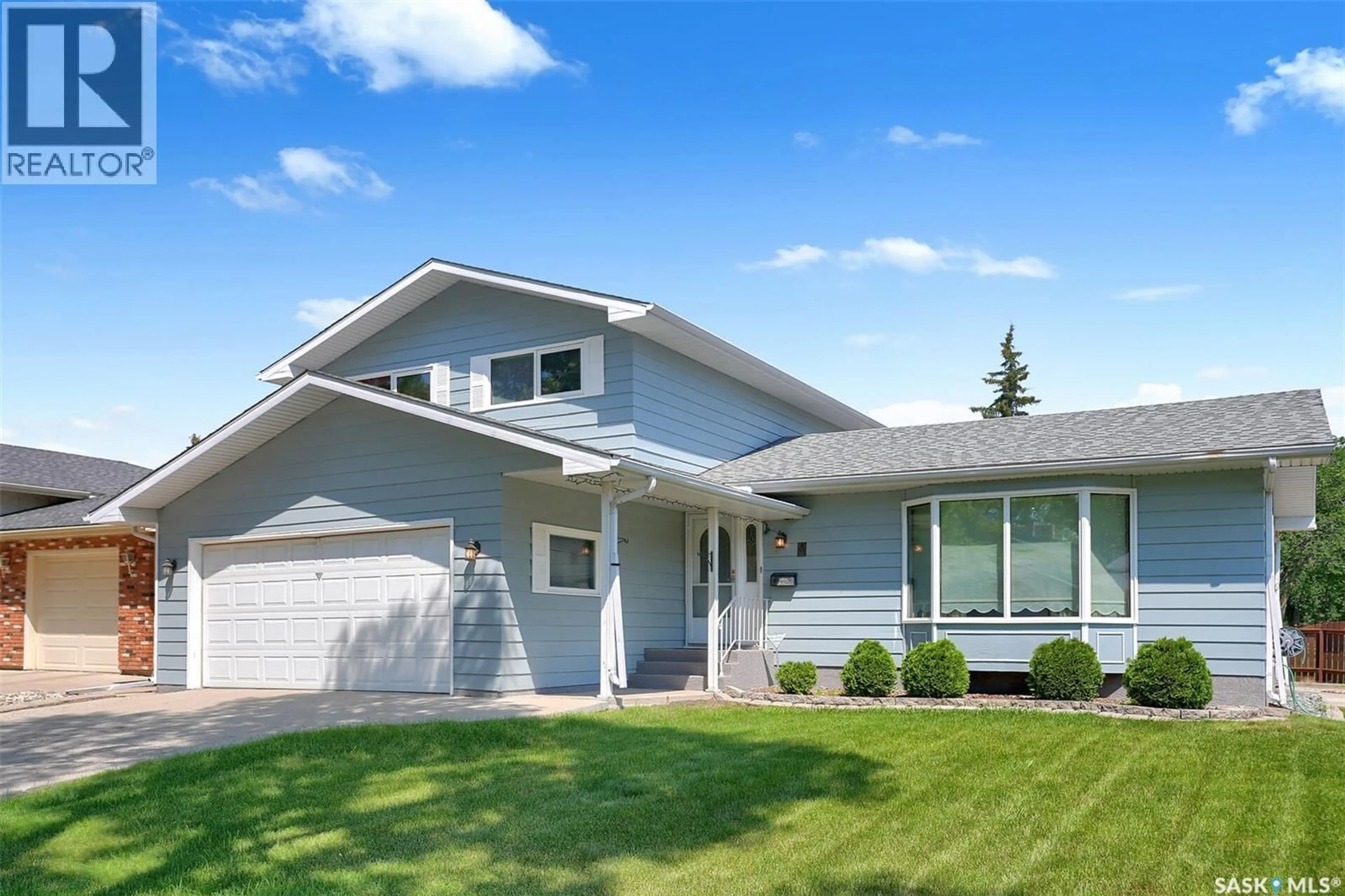 Home with vinyl exterior material, street for 4 GROOME AVENUE, Regina Saskatchewan S4S6E6