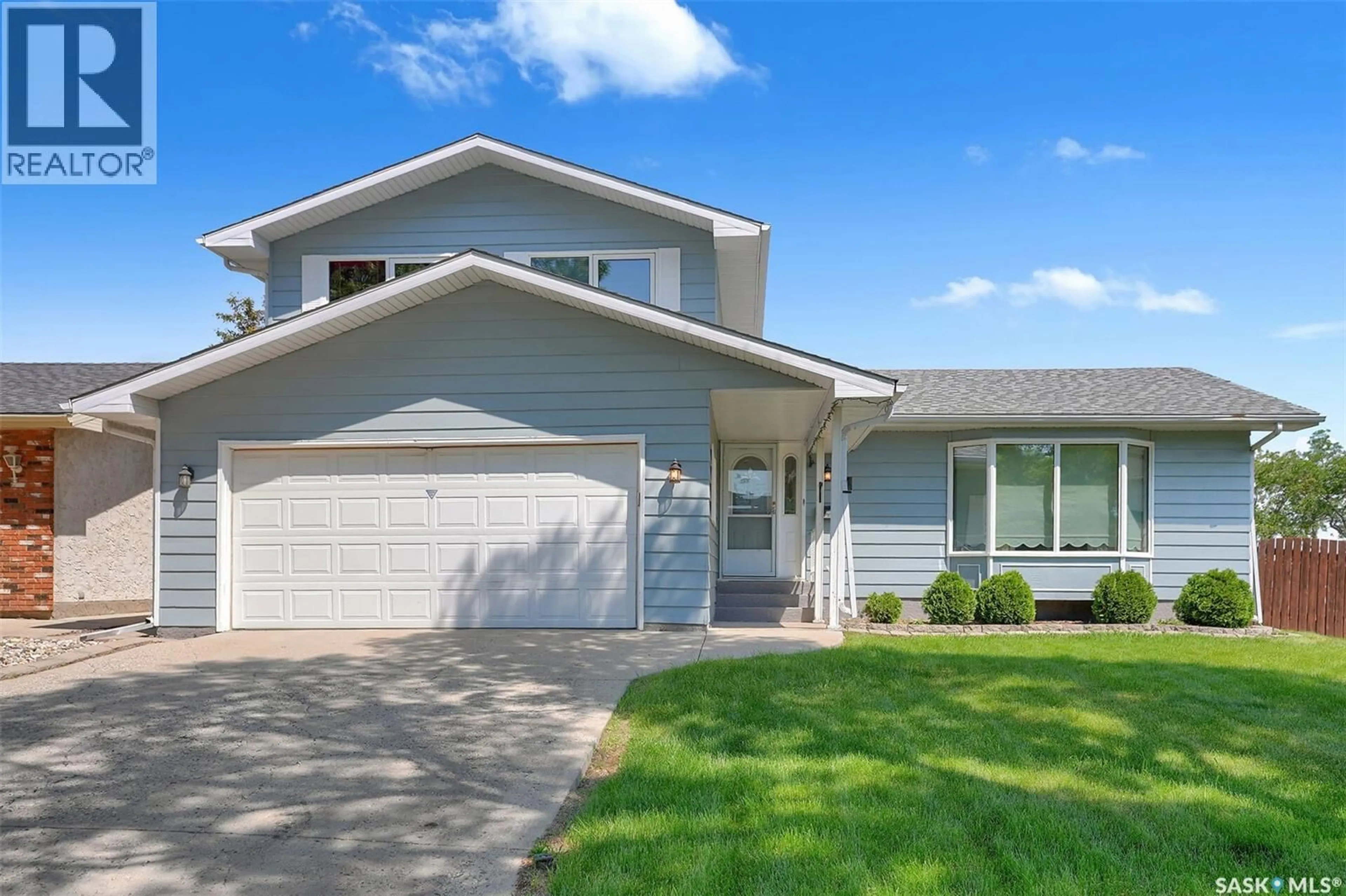 Home with vinyl exterior material, street for 4 GROOME AVENUE, Regina Saskatchewan S4S6E6