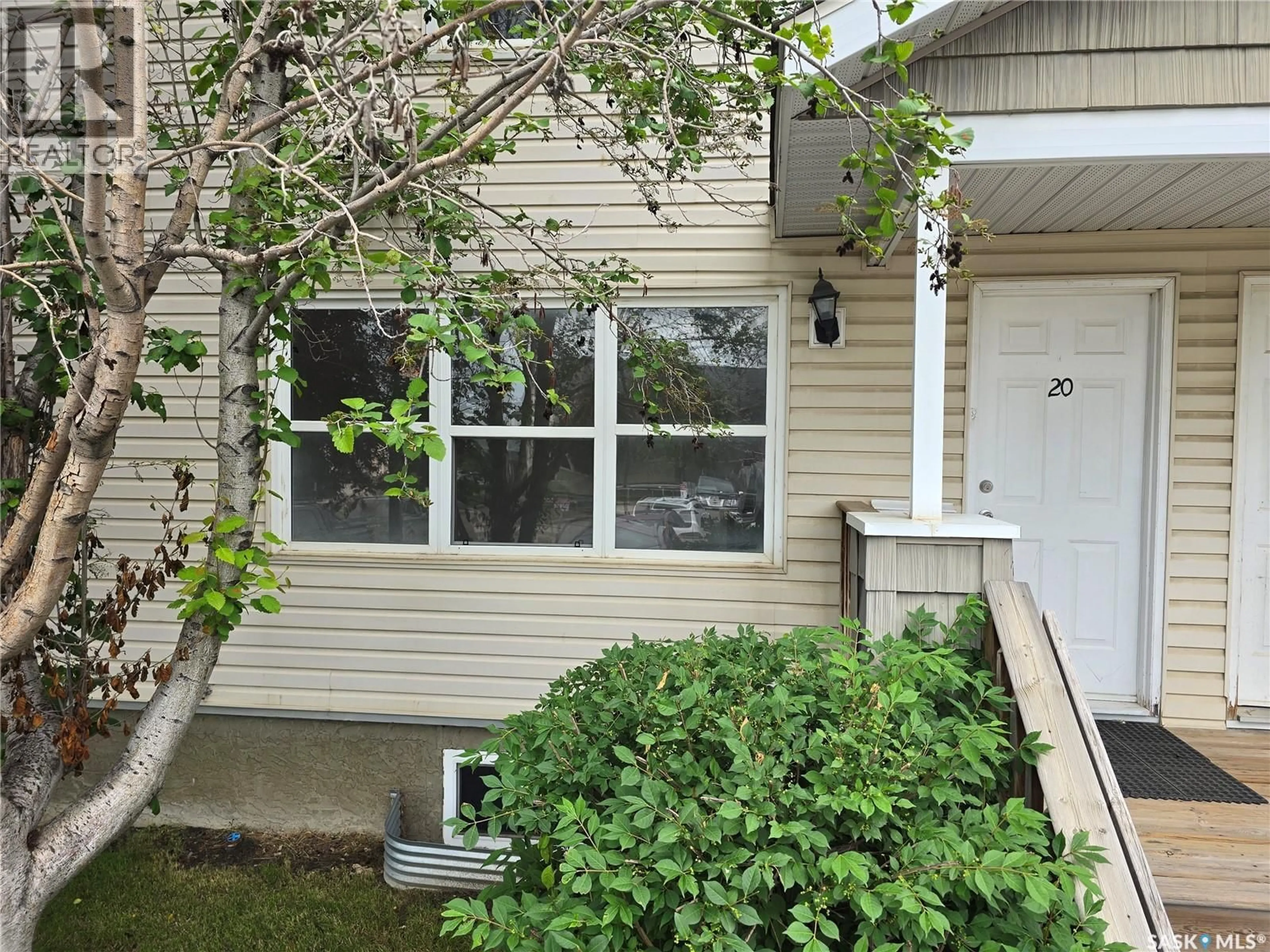 Home with vinyl exterior material, street for 210 - 20 CAMPONI PLACE, Saskatoon Saskatchewan S7M1J7