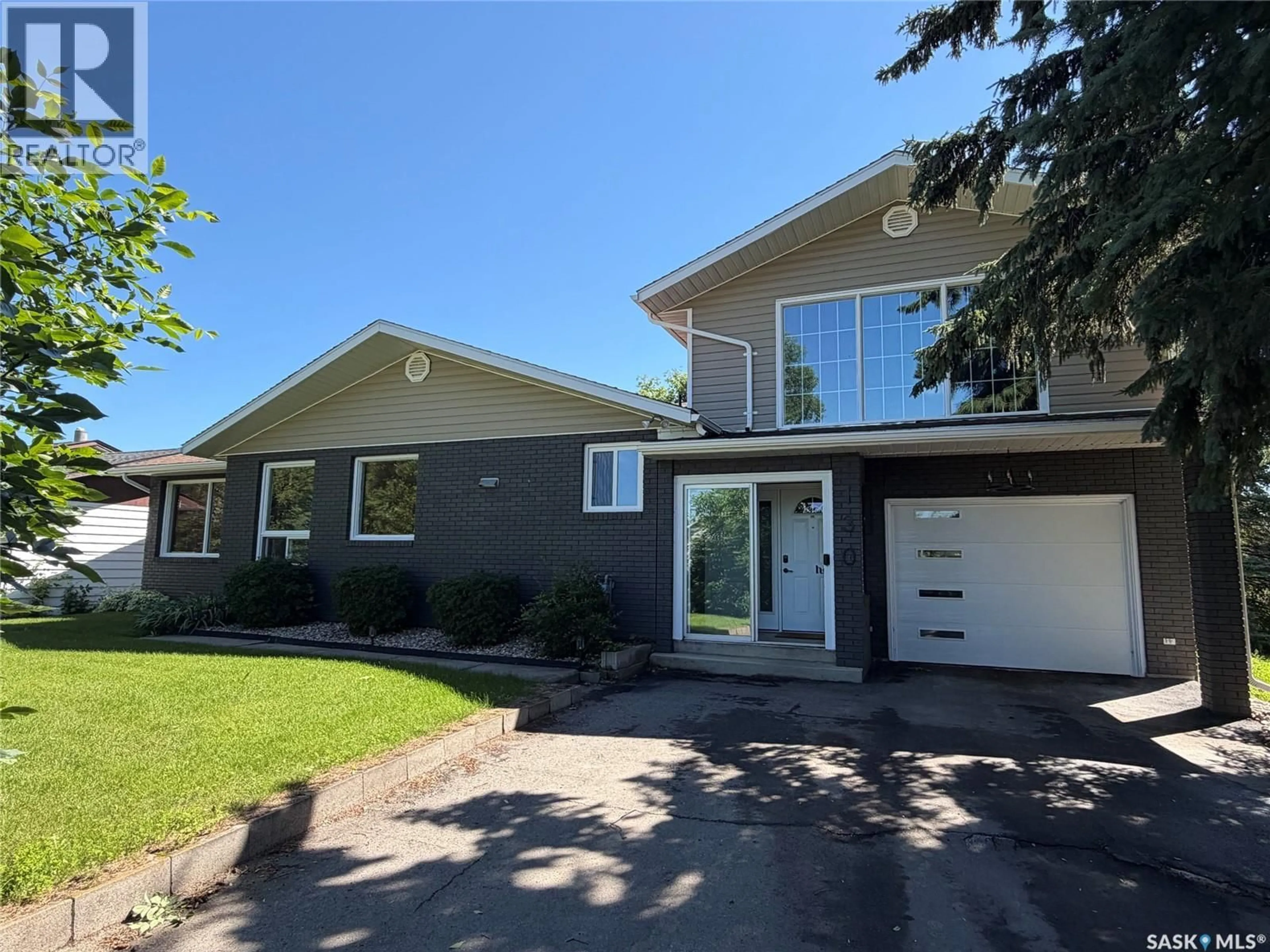 Home with vinyl exterior material, street for 130 ROSE AVENUE, Porcupine Plain Saskatchewan S0E1H0