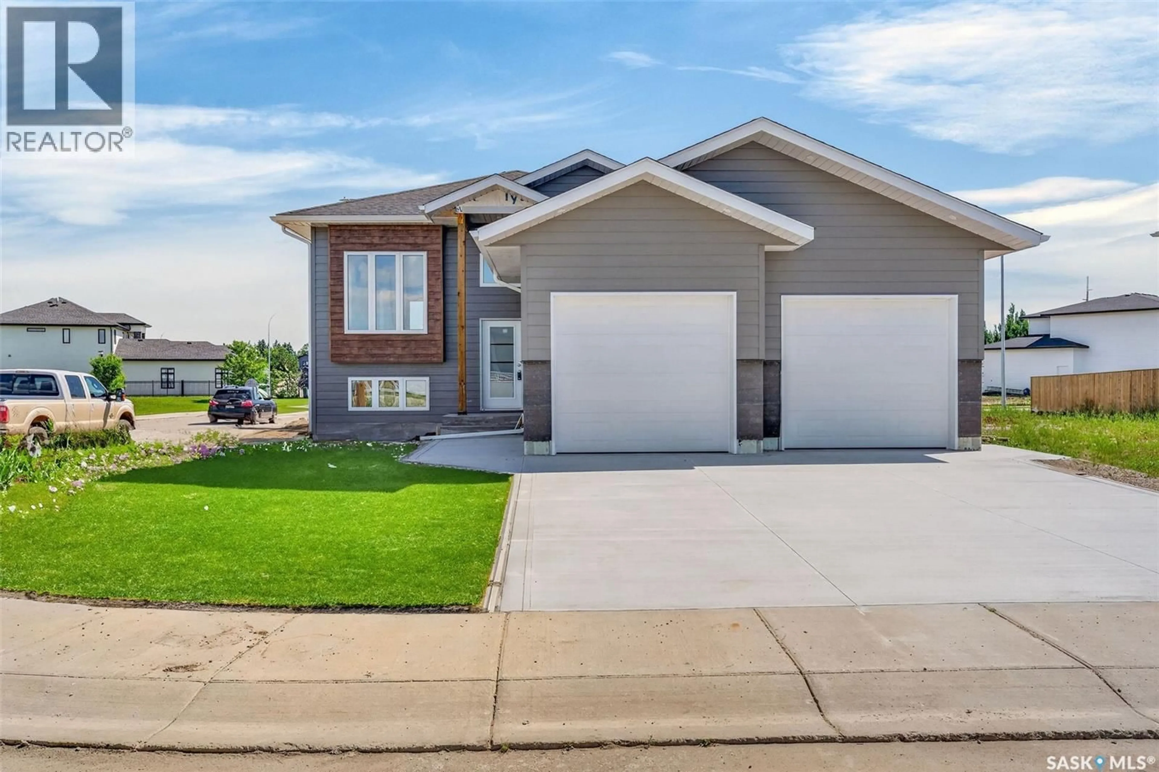 Home with vinyl exterior material, street for 801 KERR COVE, Prince Albert Saskatchewan S6W0A6