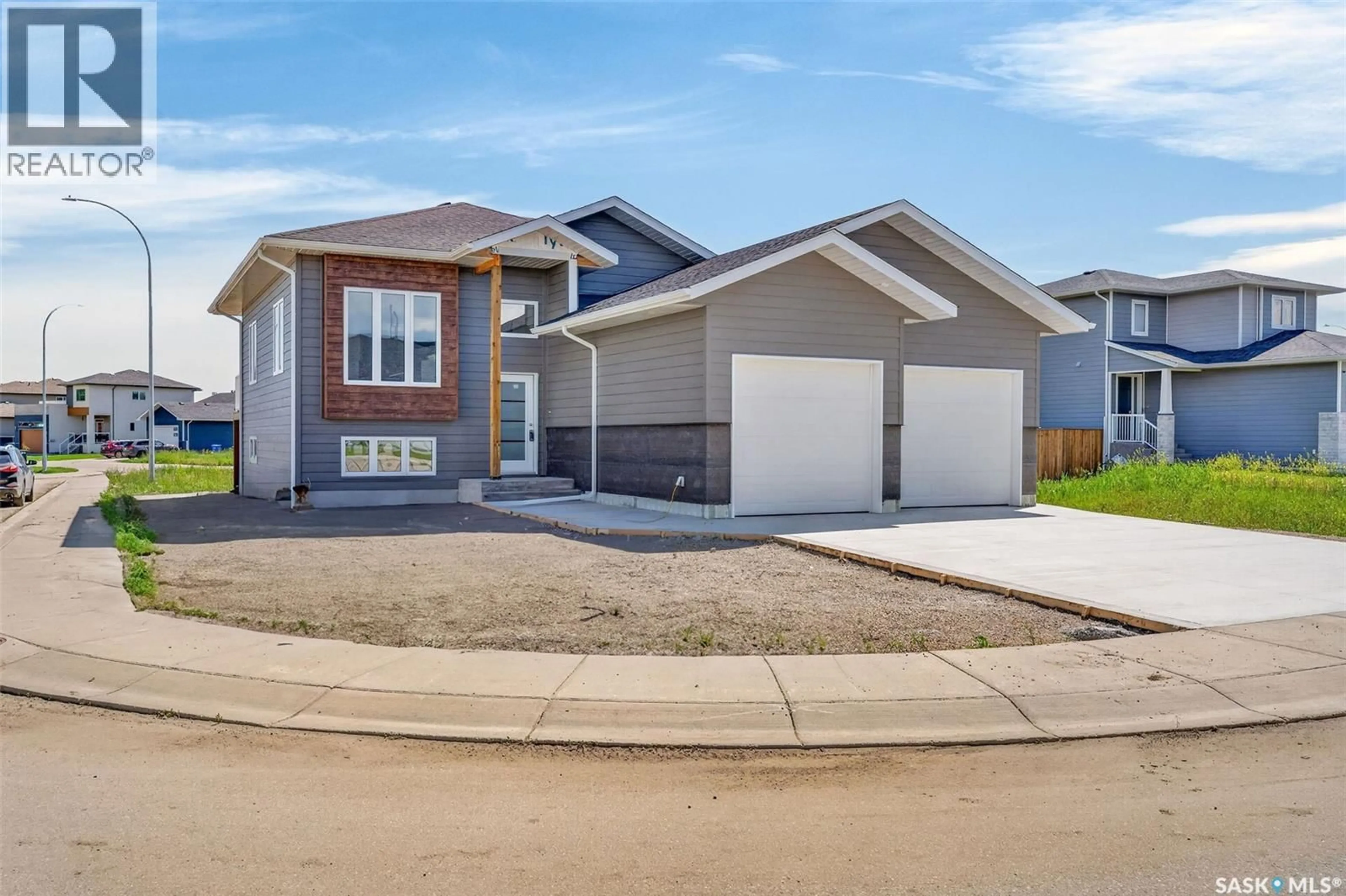 Home with vinyl exterior material, street for 801 KERR COVE, Prince Albert Saskatchewan S6W0A6