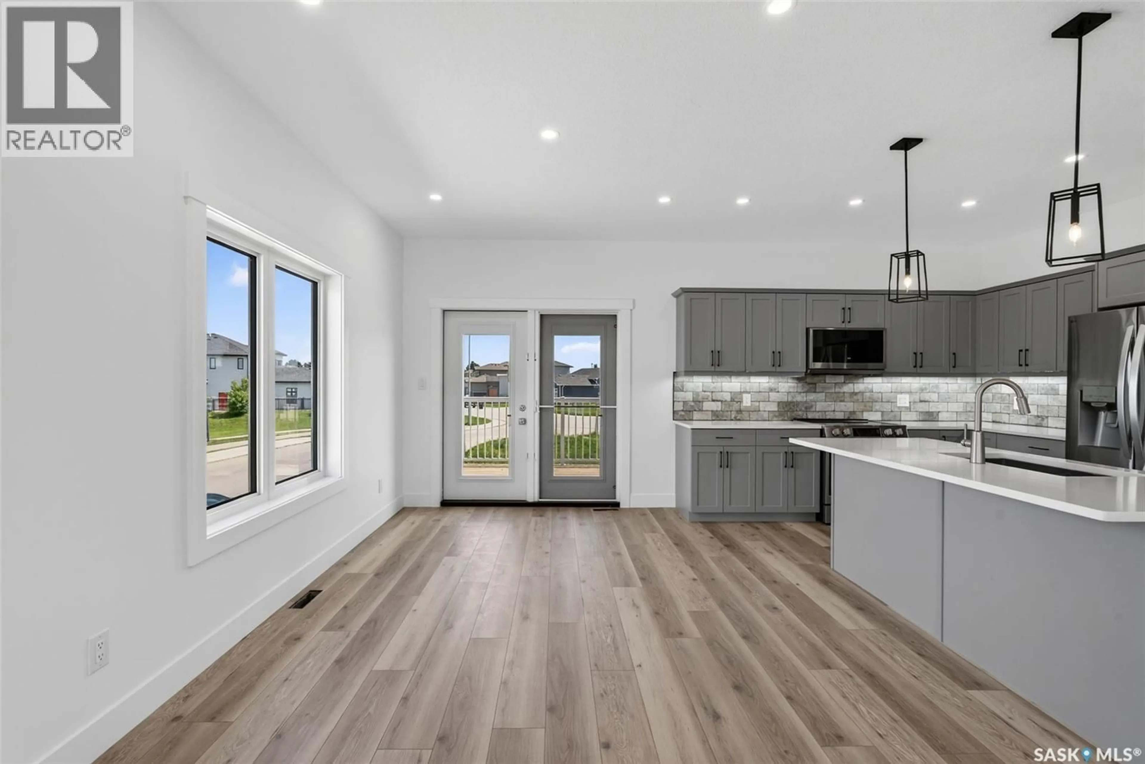 Open concept kitchen, unknown for 801 KERR COVE, Prince Albert Saskatchewan S6W0A6