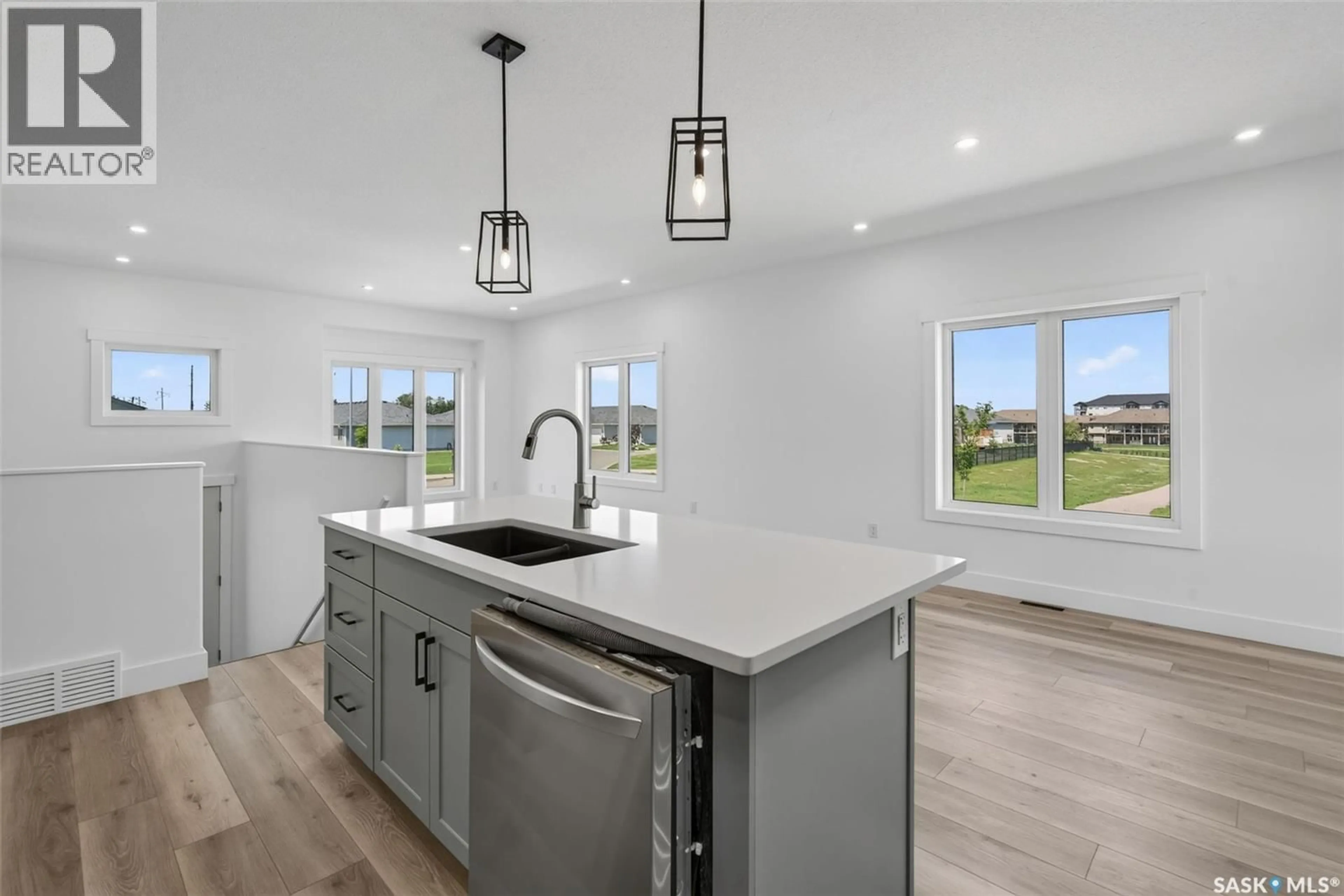Open concept kitchen, ceramic/tile floor for 801 KERR COVE, Prince Albert Saskatchewan S6W0A6