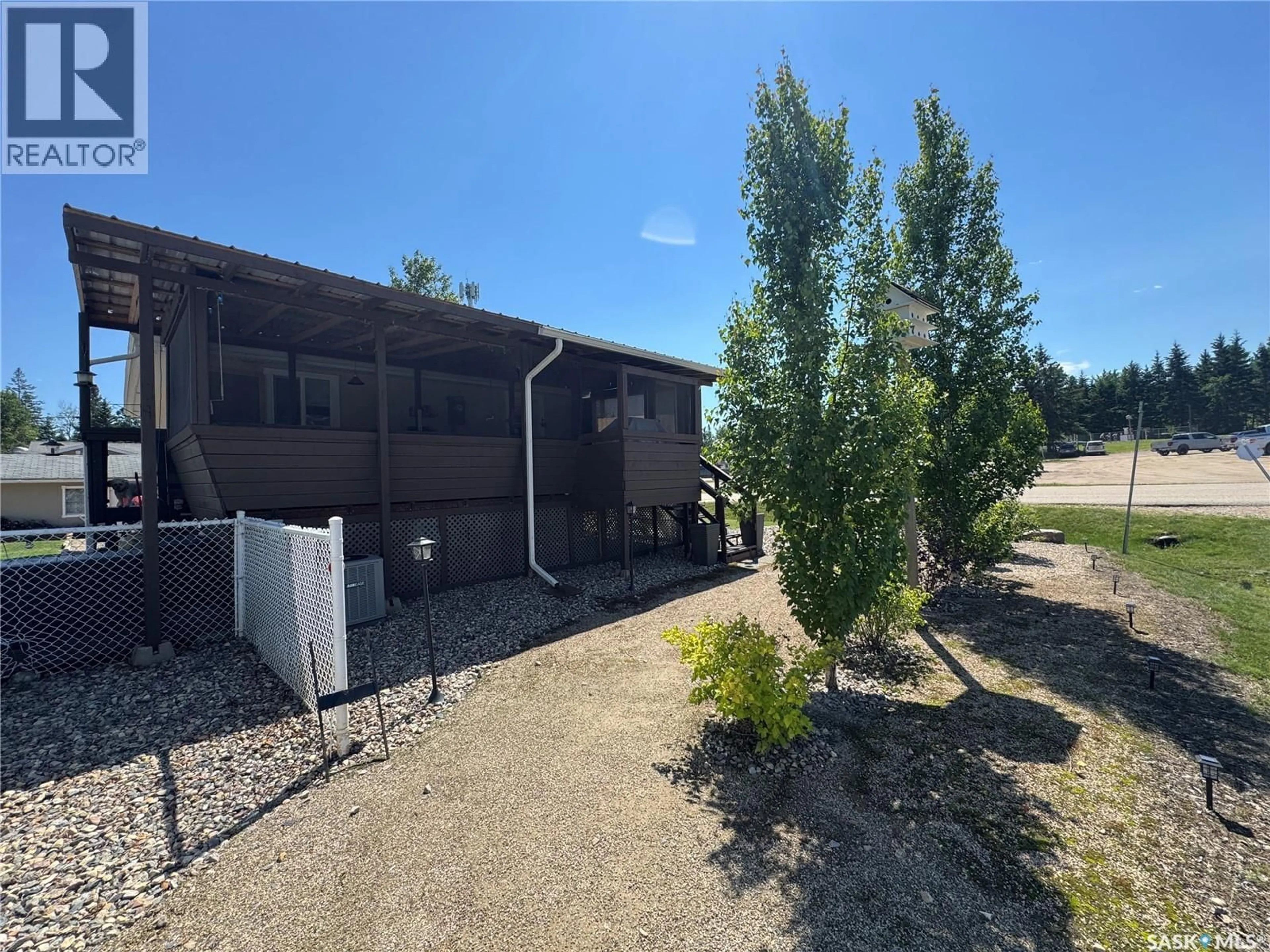 A pic from outside/outdoor area/front of a property/back of a property/a pic from drone, unknown for 504 SOUTHSHORE DRIVE, Emma Lake Saskatchewan S0J0N0