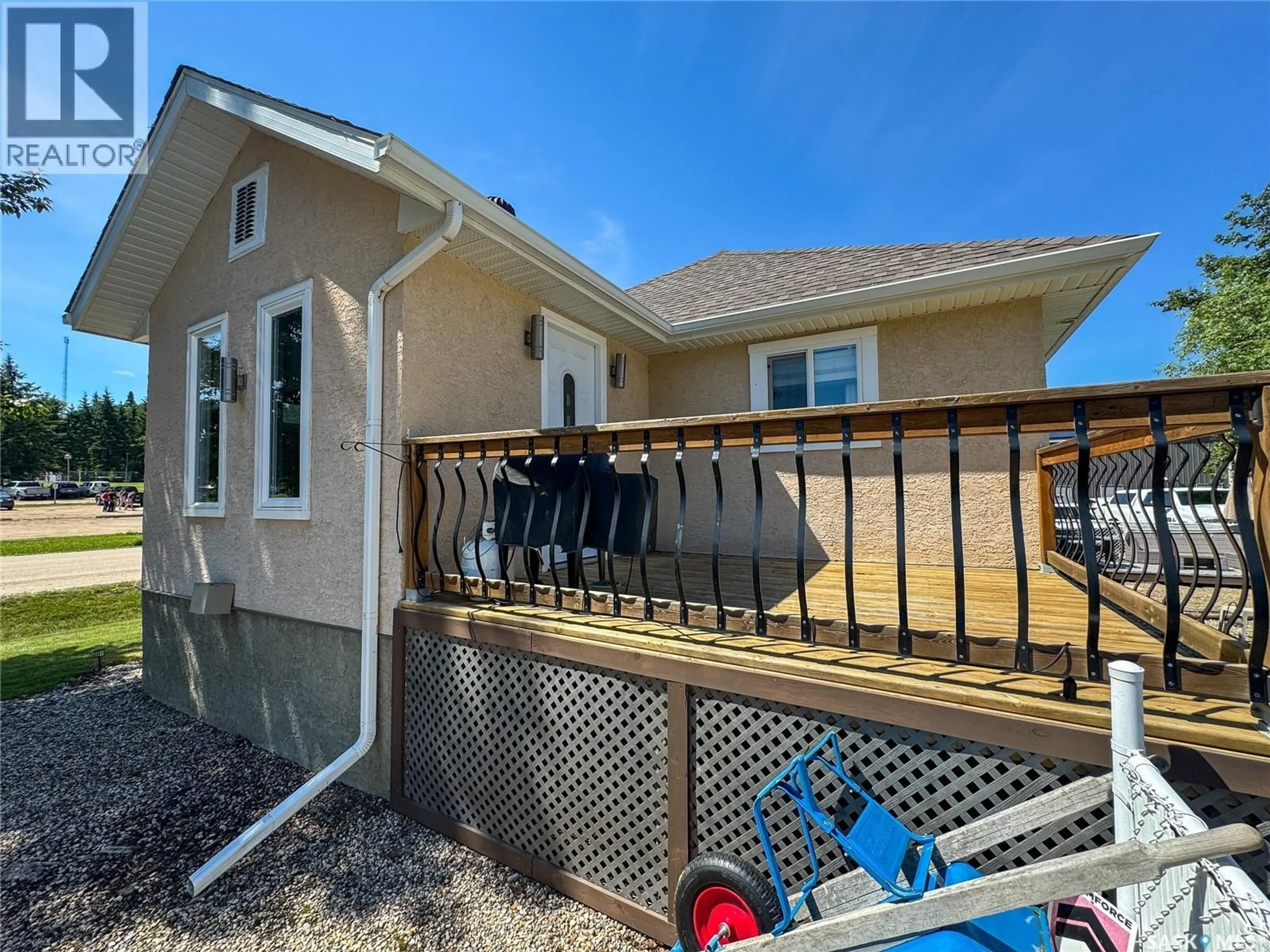 Home with vinyl exterior material, street for 504 SOUTHSHORE DRIVE, Emma Lake Saskatchewan S0J0N0
