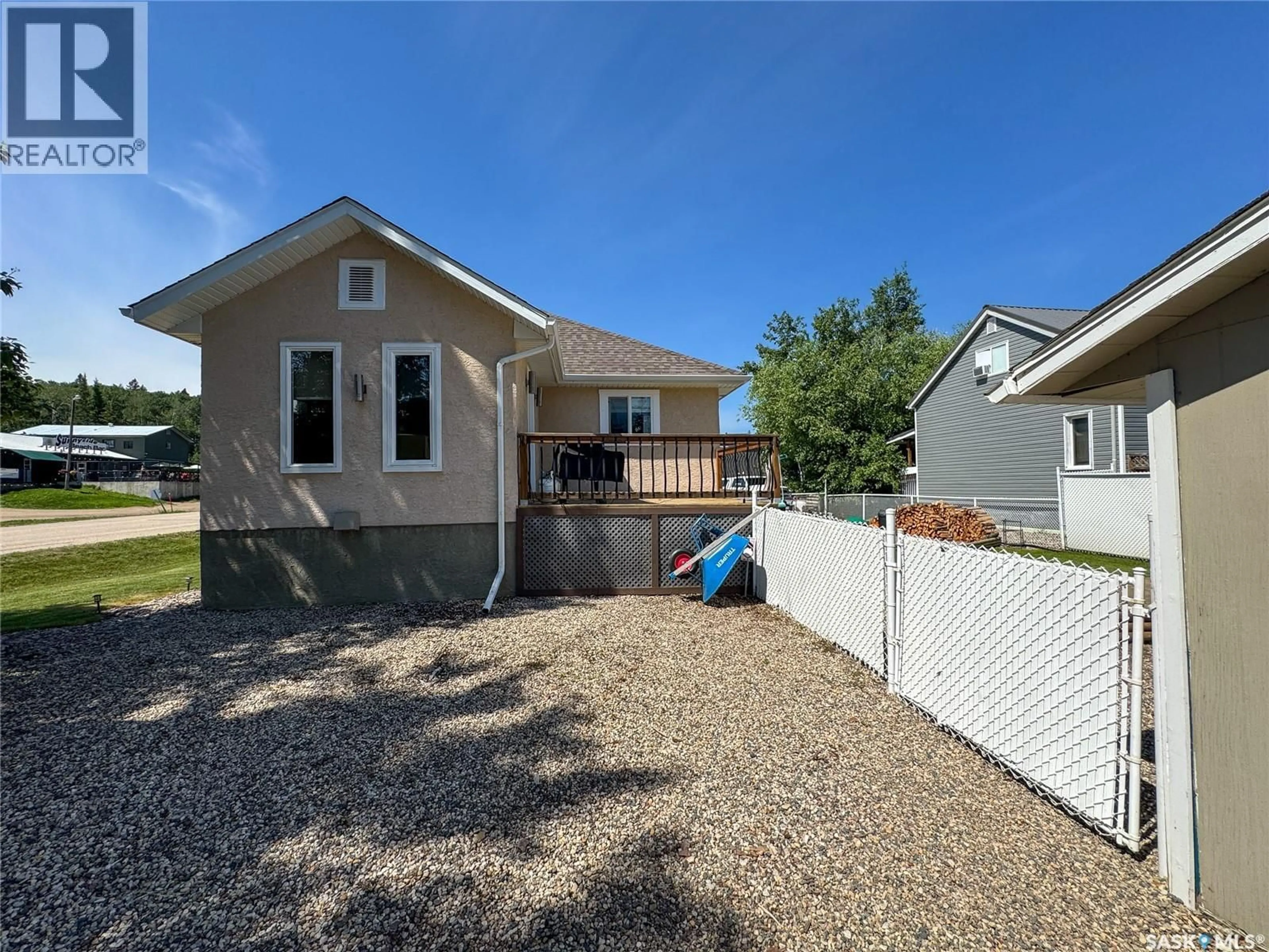 Home with vinyl exterior material, street for 504 SOUTHSHORE DRIVE, Emma Lake Saskatchewan S0J0N0