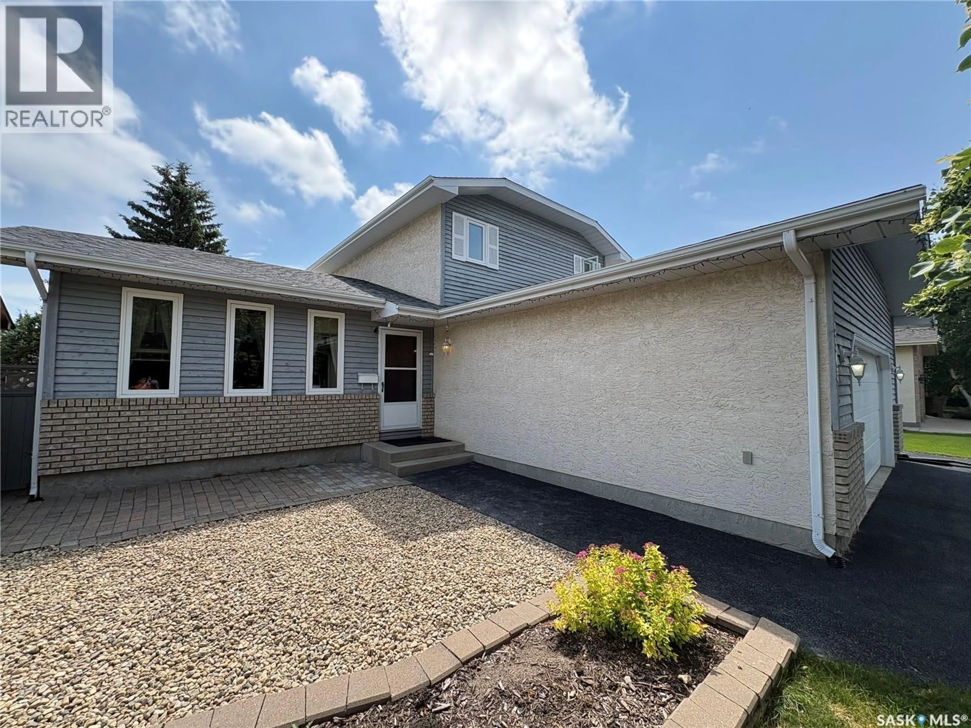 Home with vinyl exterior material, street for 5503 BALLANTINE COURT, Regina Saskatchewan S4X4K4
