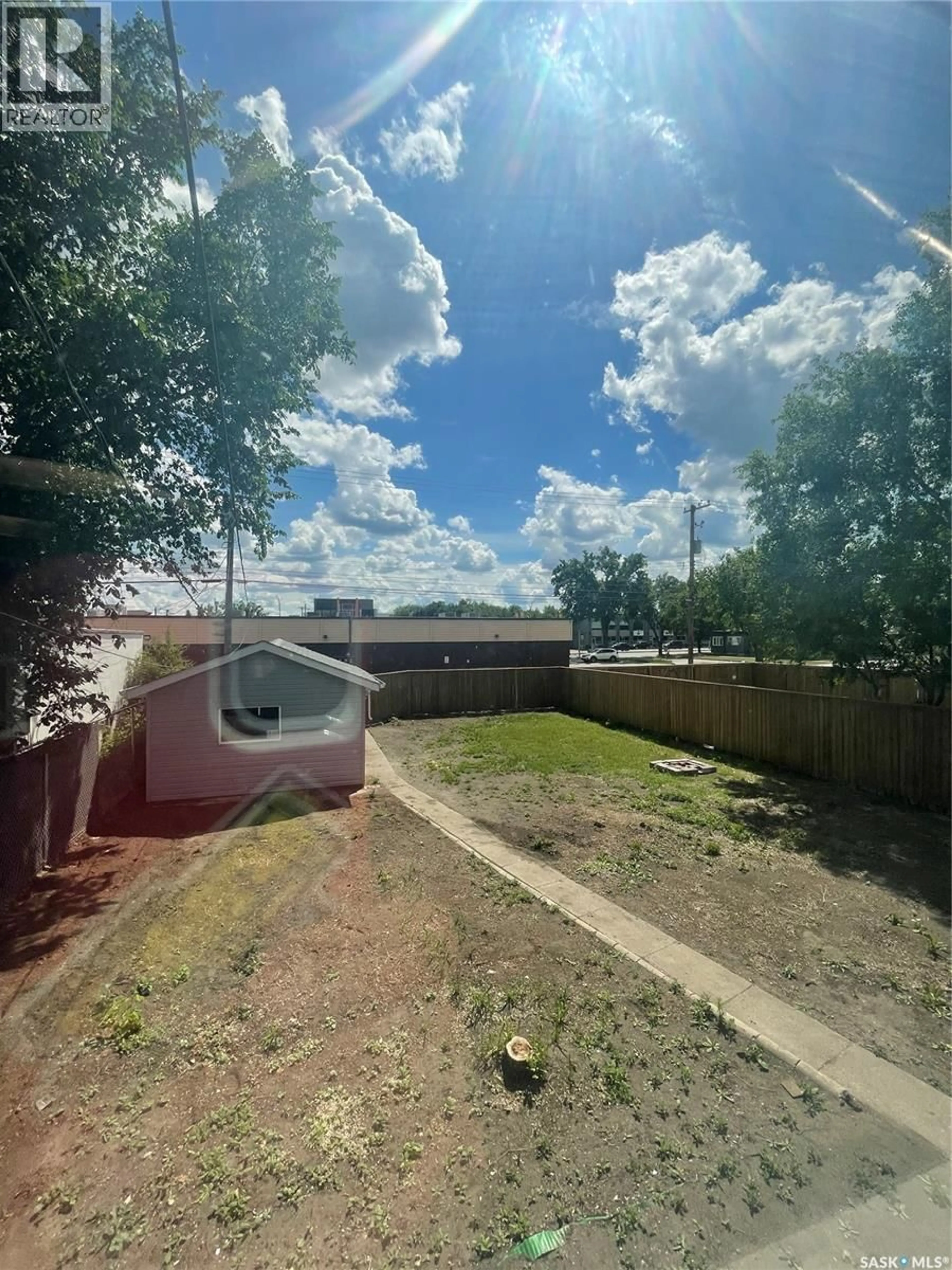 A pic from outside/outdoor area/front of a property/back of a property/a pic from drone, street for 911 23RD STREET, Saskatoon Saskatchewan S7L0A5