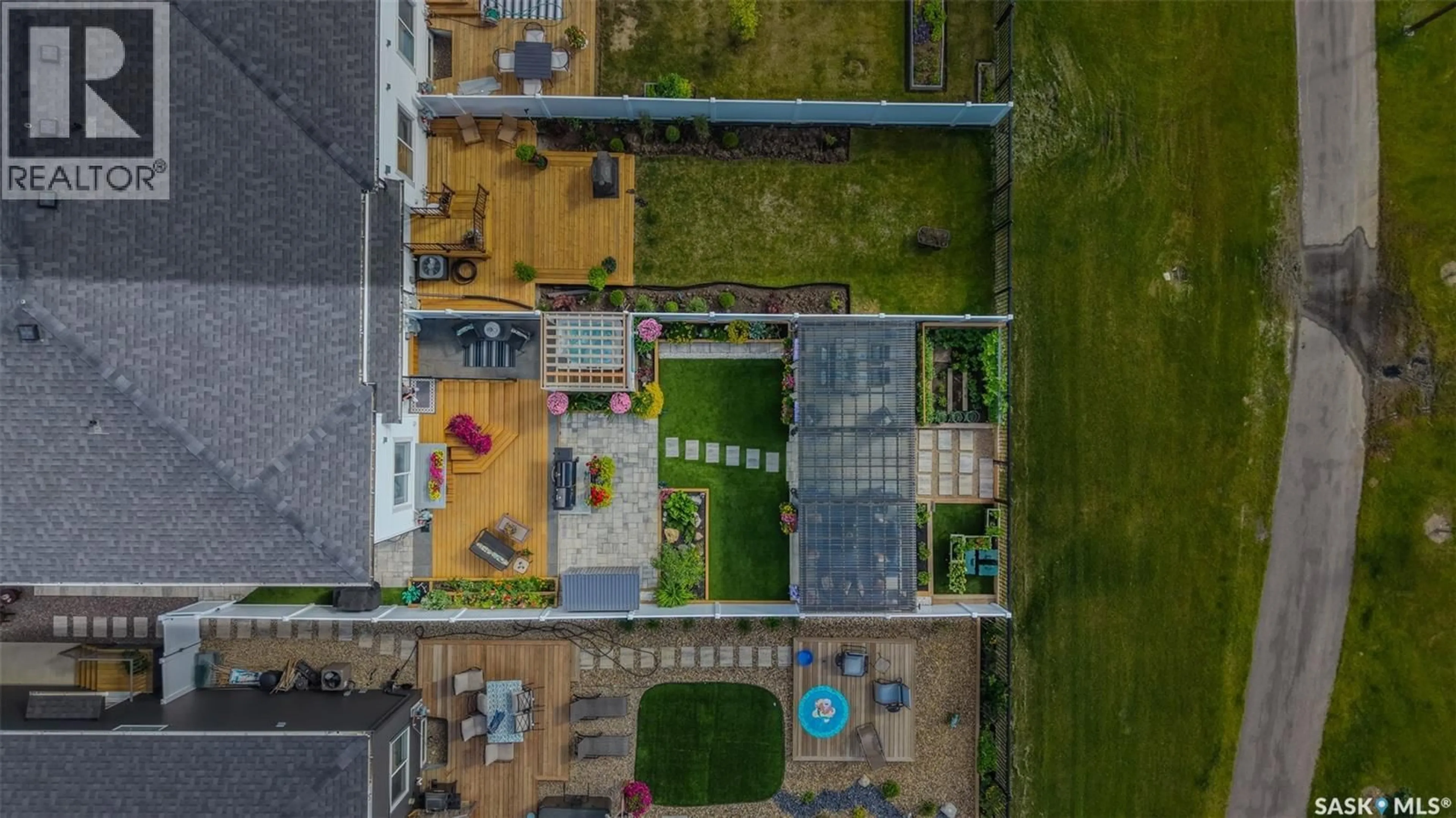 A pic from outside/outdoor area/front of a property/back of a property/a pic from drone, unknown for 848 BRIGHTON GATE, Saskatoon Saskatchewan S7V1L3