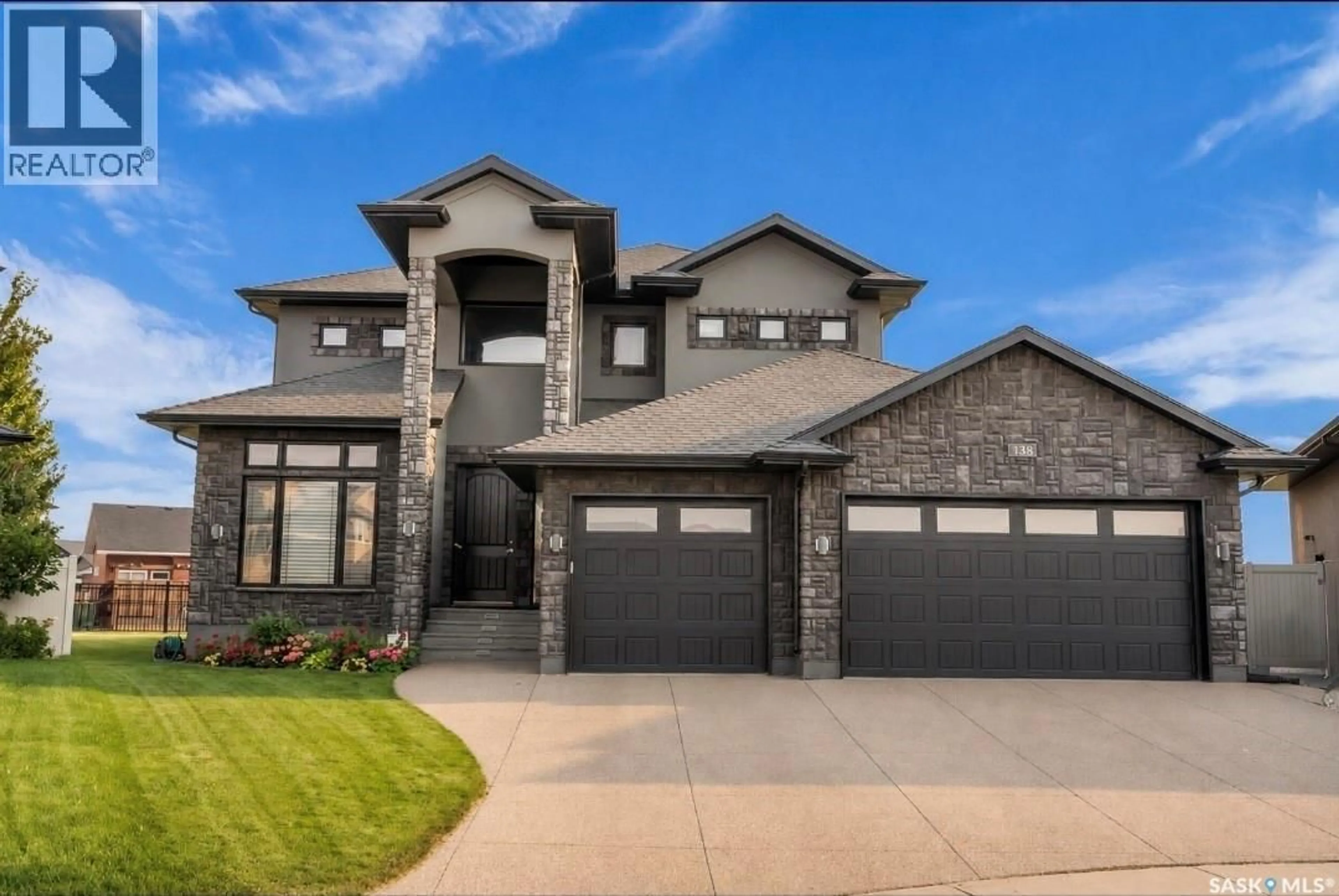 Home with brick exterior material, street for 138 FLEGEL COURT, Saskatoon Saskatchewan S7V0B9