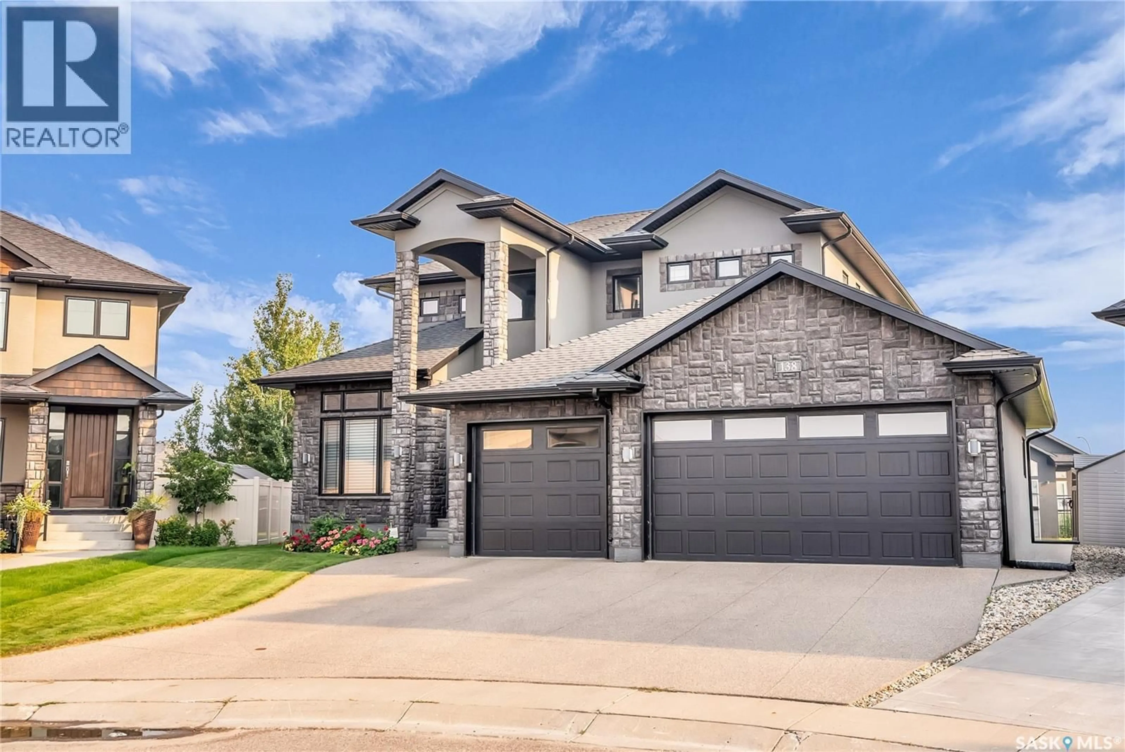 Home with brick exterior material, street for 138 FLEGEL COURT, Saskatoon Saskatchewan S7V0B9