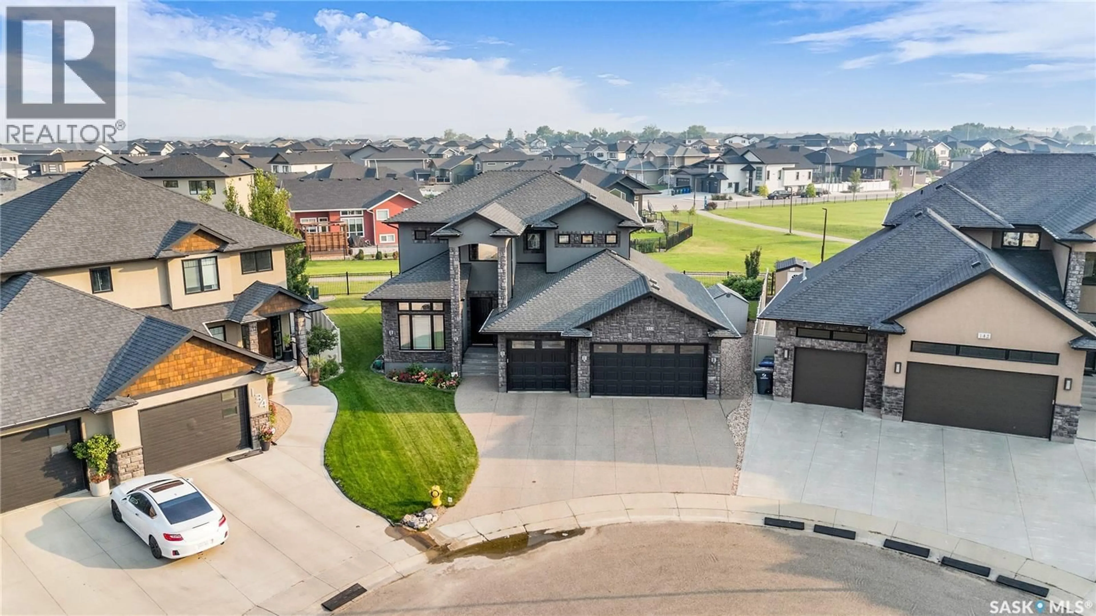 A pic from outside/outdoor area/front of a property/back of a property/a pic from drone, street for 138 FLEGEL COURT, Saskatoon Saskatchewan S7V0B9