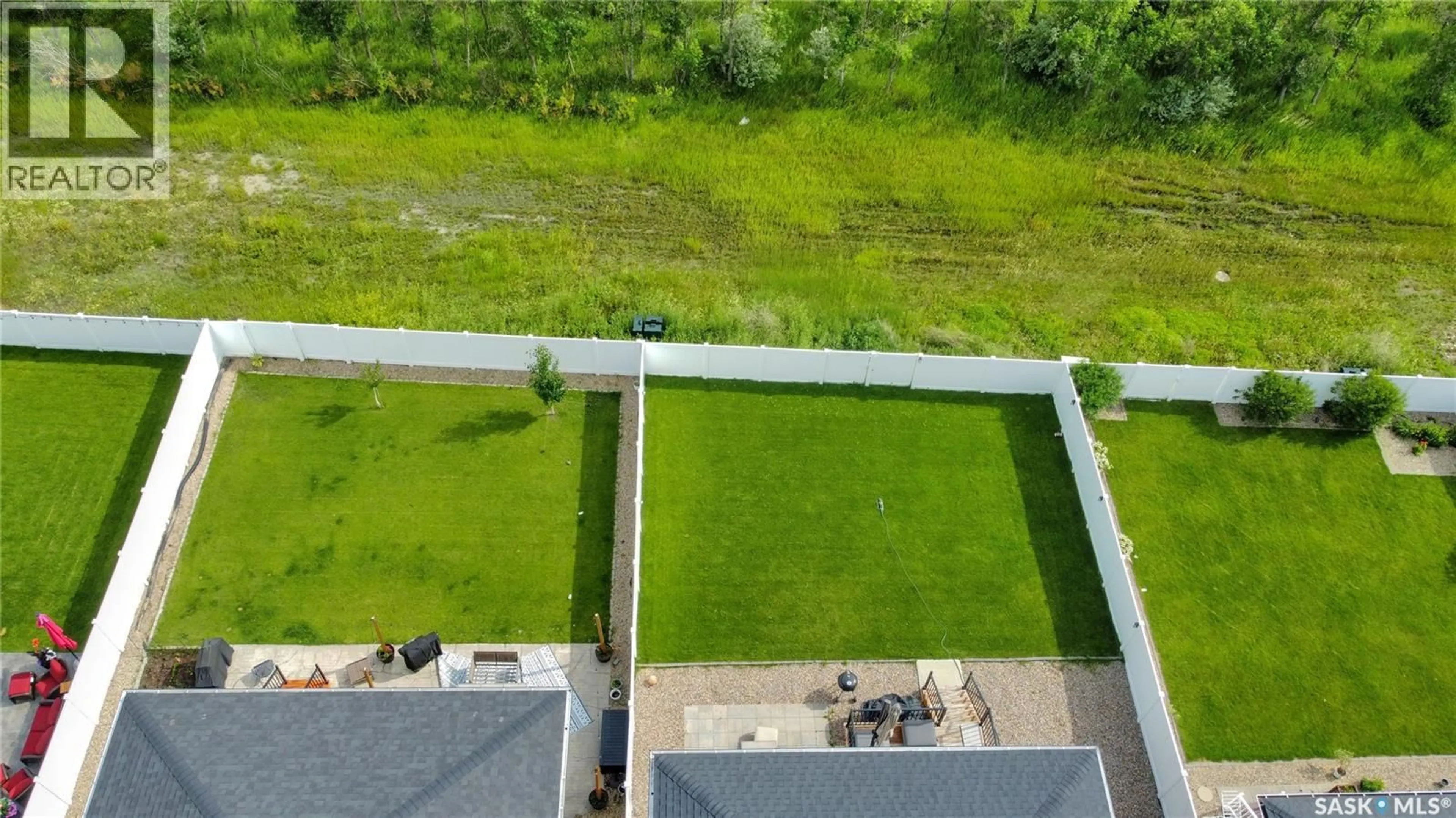 A pic from outside/outdoor area/front of a property/back of a property/a pic from drone, water/lake/river/ocean view for 1049 MAPLEWOOD DRIVE, Moose Jaw Saskatchewan S6J0B6