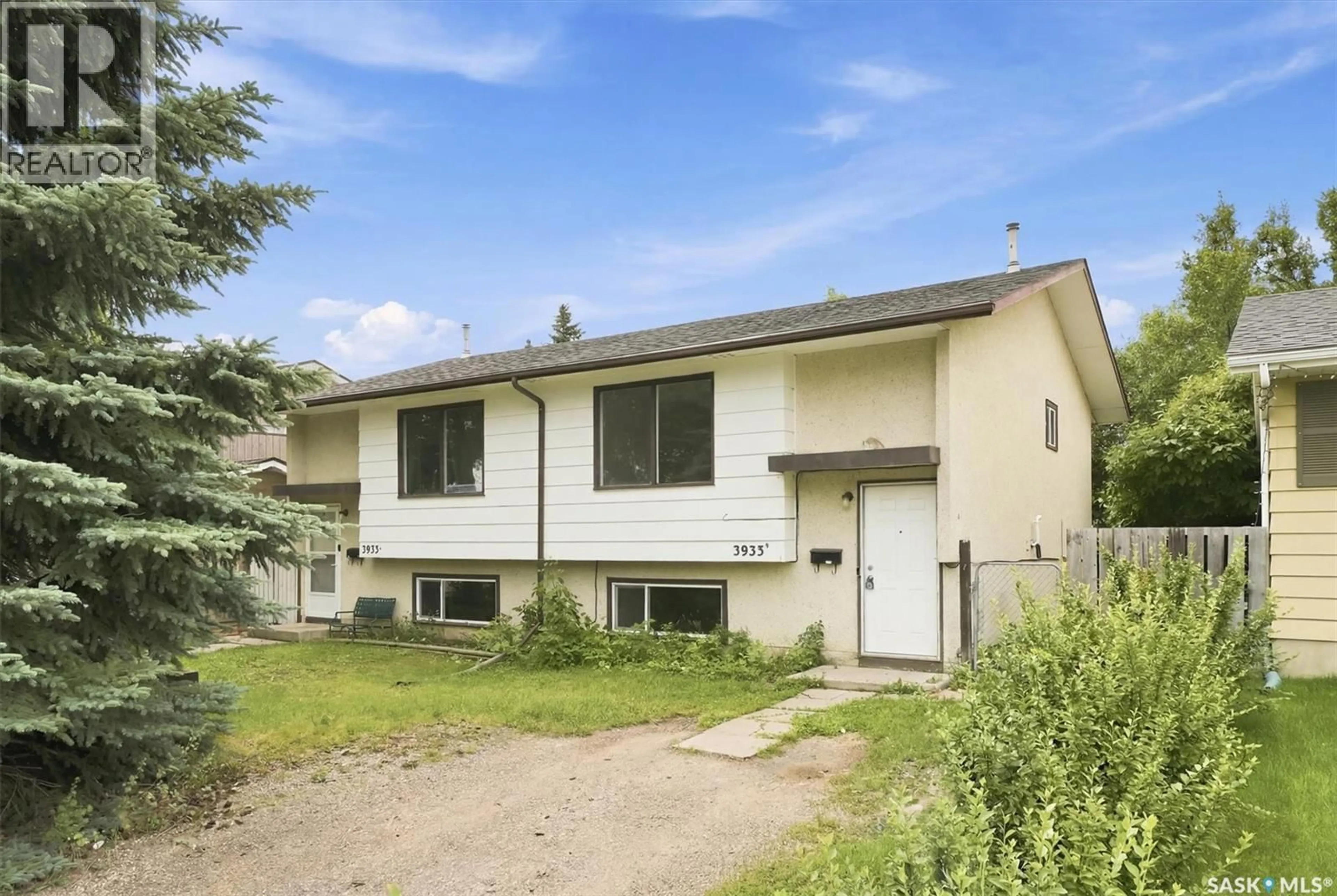 Home with vinyl exterior material, street for A/B - 3933 CENTENNIAL DRIVE, Saskatoon Saskatchewan S7L5T3