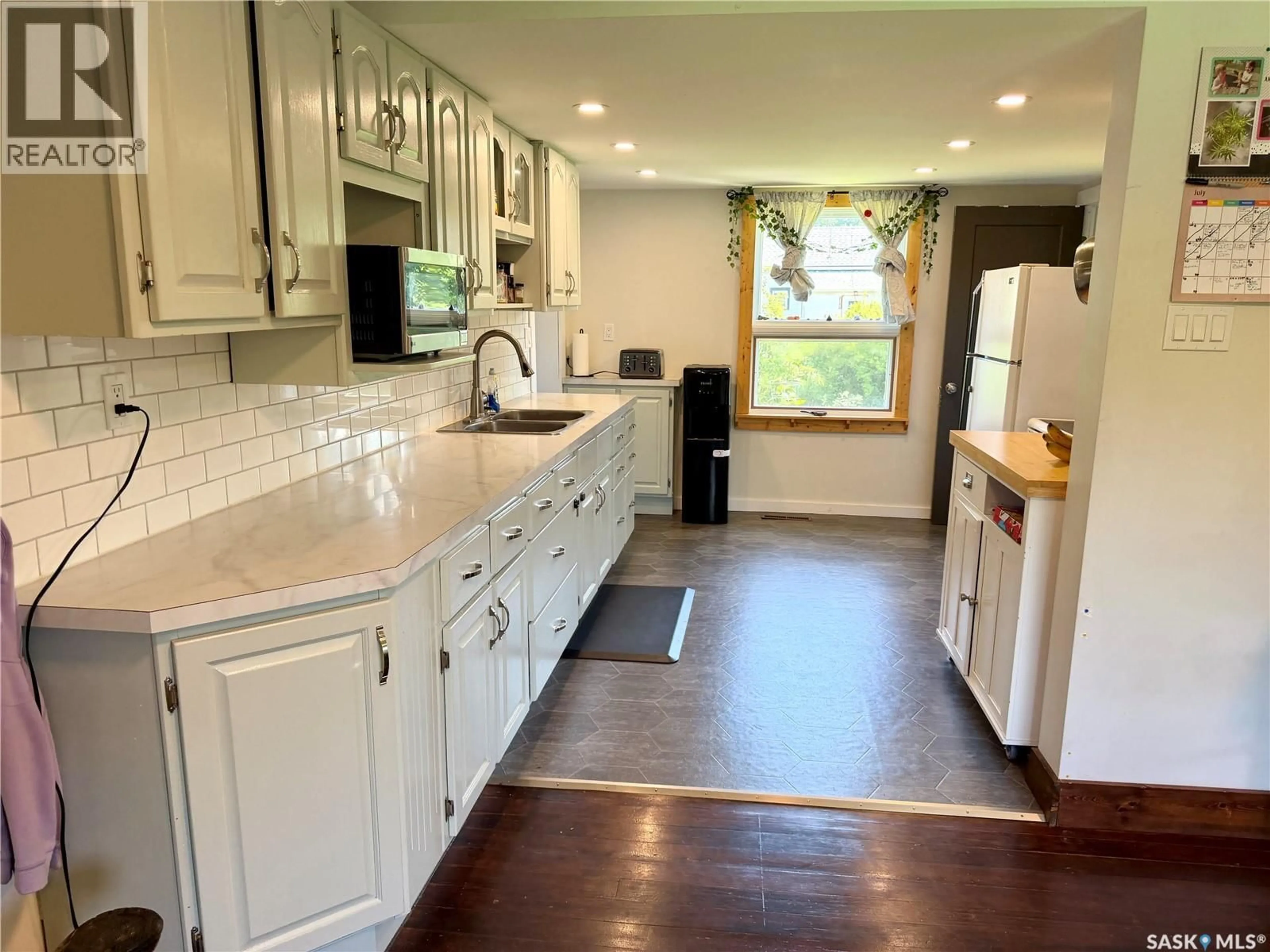 Open concept kitchen, ceramic/tile floor for 402 4TH STREET, Medstead Saskatchewan S0M1W0