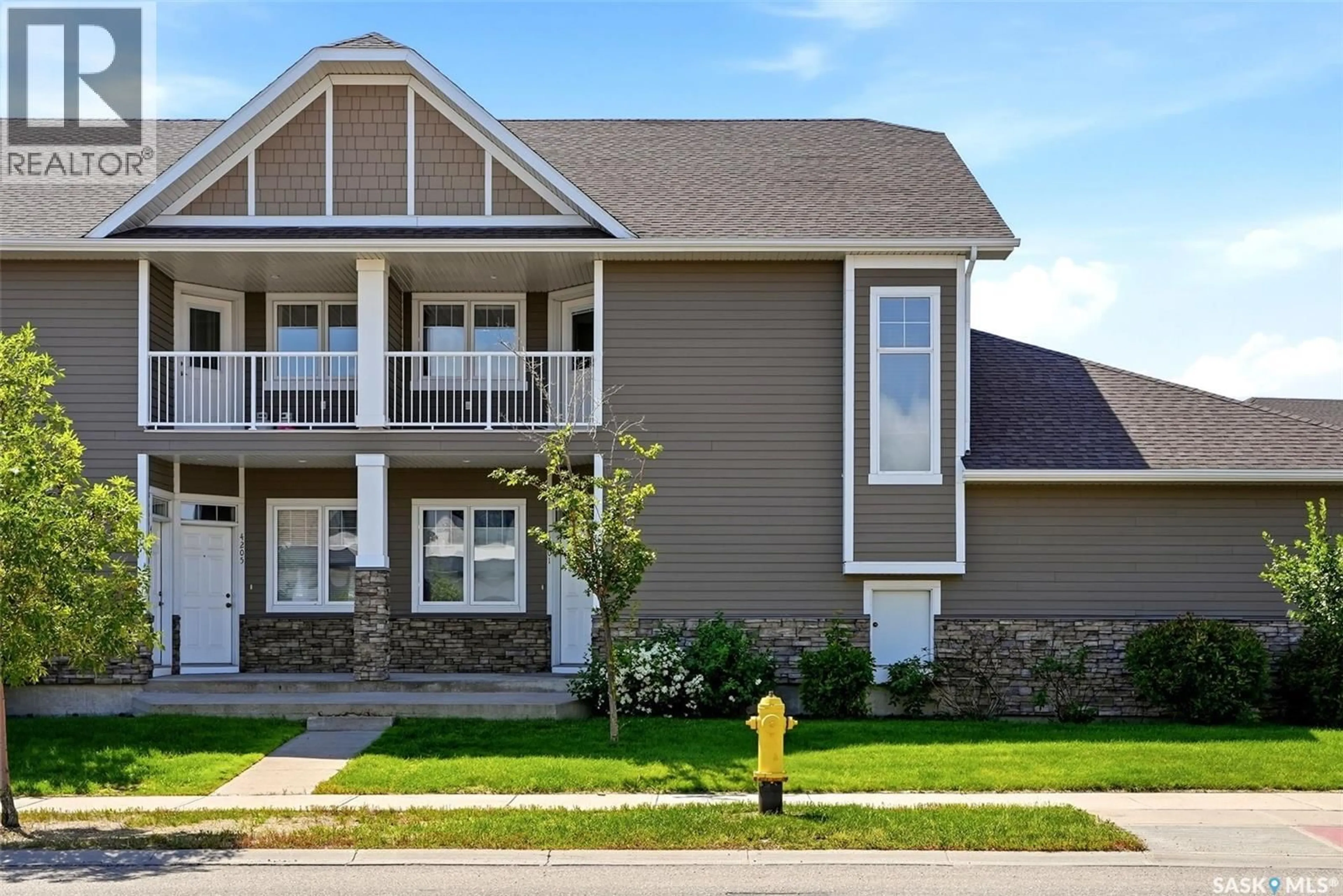 Home with vinyl exterior material, street for E - 4203 GREEN APPLE DRIVE, Regina Saskatchewan S4V1M6