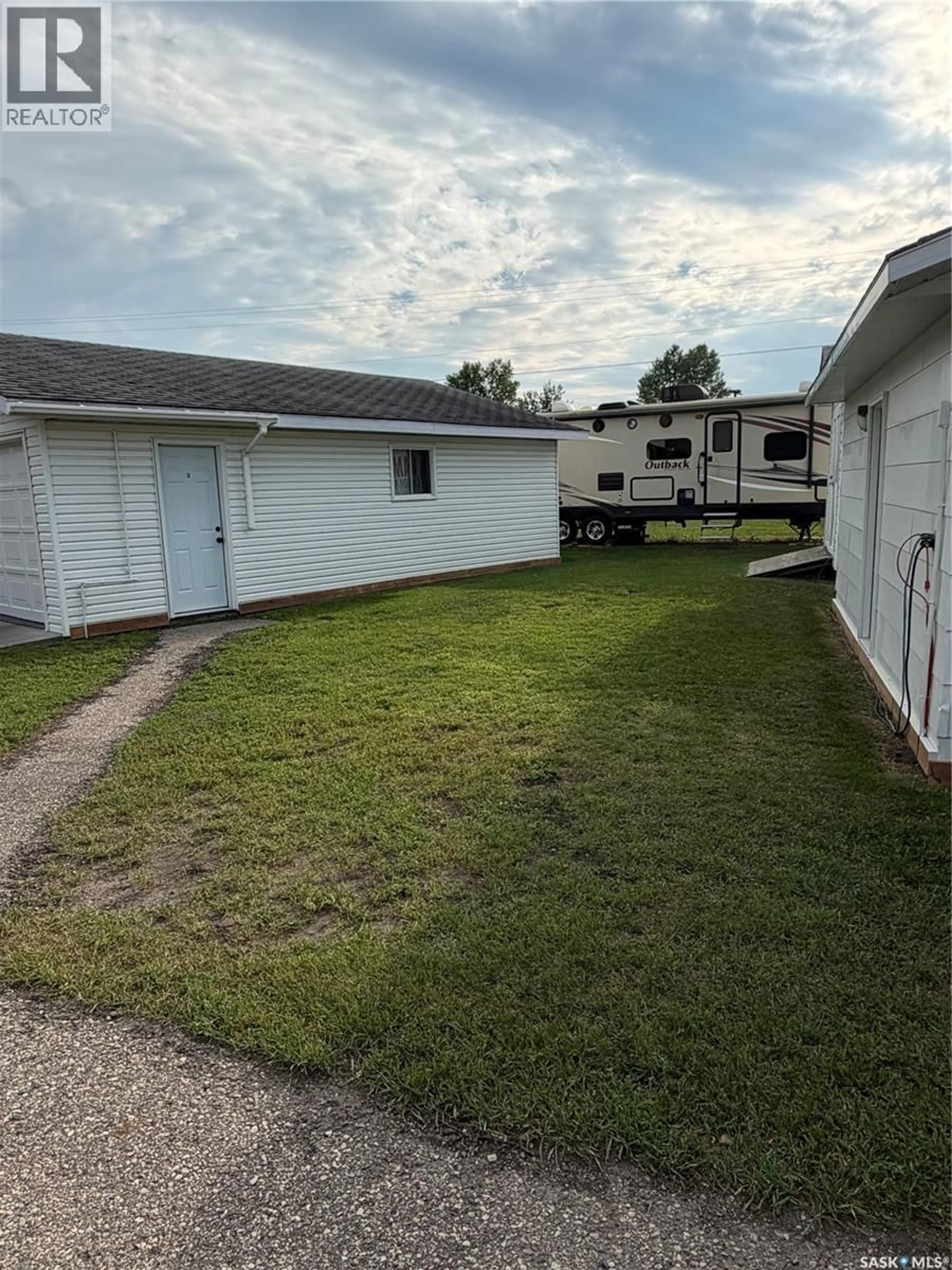 A pic from outside/outdoor area/front of a property/back of a property/a pic from drone, street for 01 KIRSTEIN CRESCENT, Hudson Bay Rm No. 394 Saskatchewan S0E0Y0