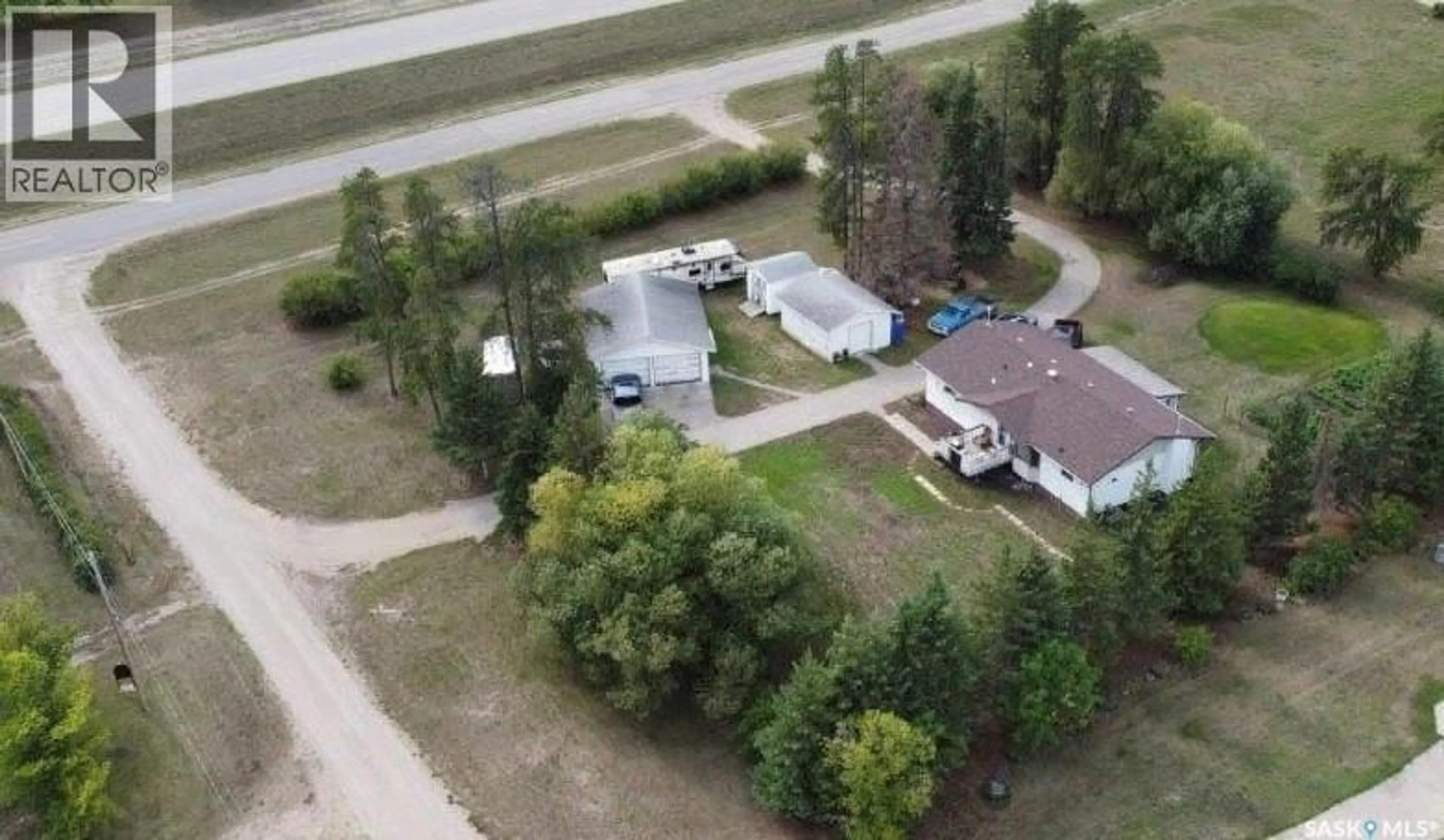 A pic from outside/outdoor area/front of a property/back of a property/a pic from drone, street for 01 KIRSTEIN CRESCENT, Hudson Bay Rm No. 394 Saskatchewan S0E0Y0