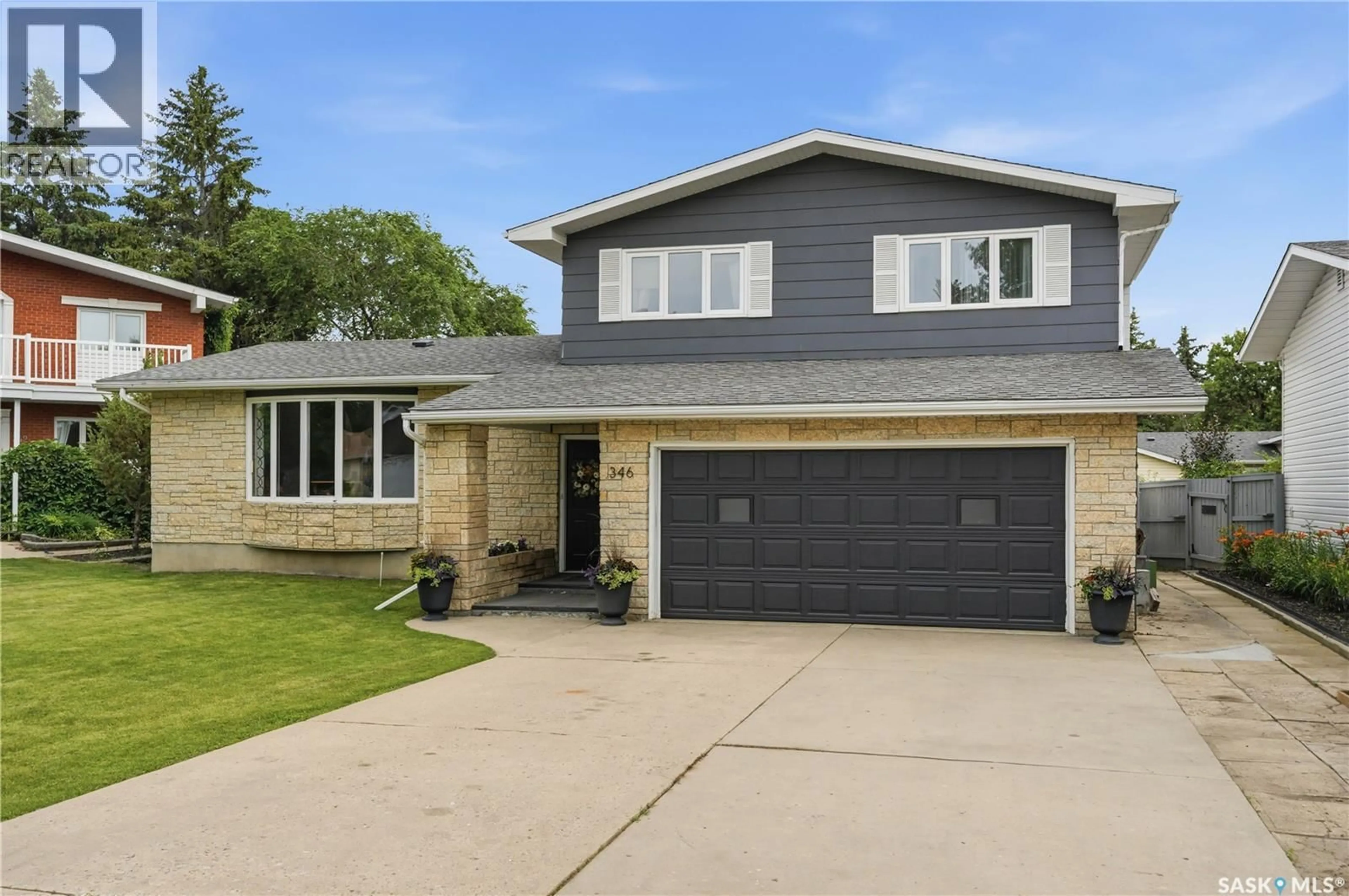 Home with brick exterior material, street for 346 HIGHBURY TERRACE, Saskatoon Saskatchewan S7H4X8