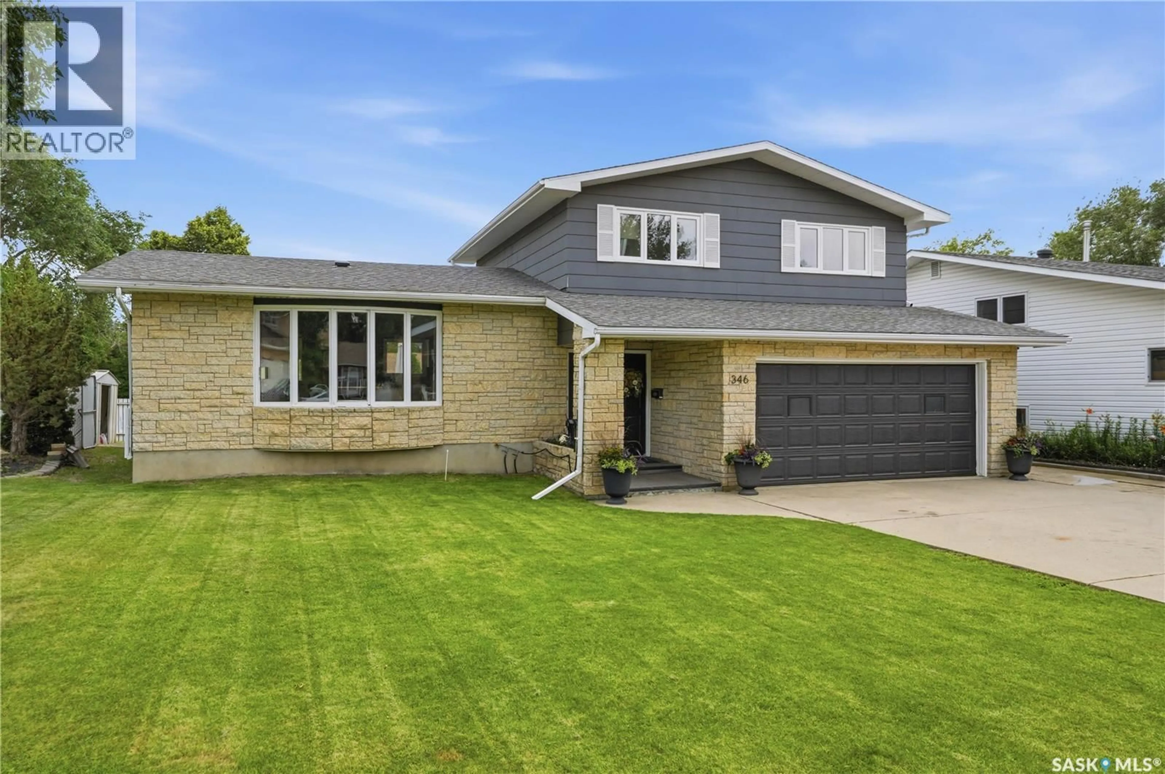 Home with brick exterior material, street for 346 HIGHBURY TERRACE, Saskatoon Saskatchewan S7H4X8