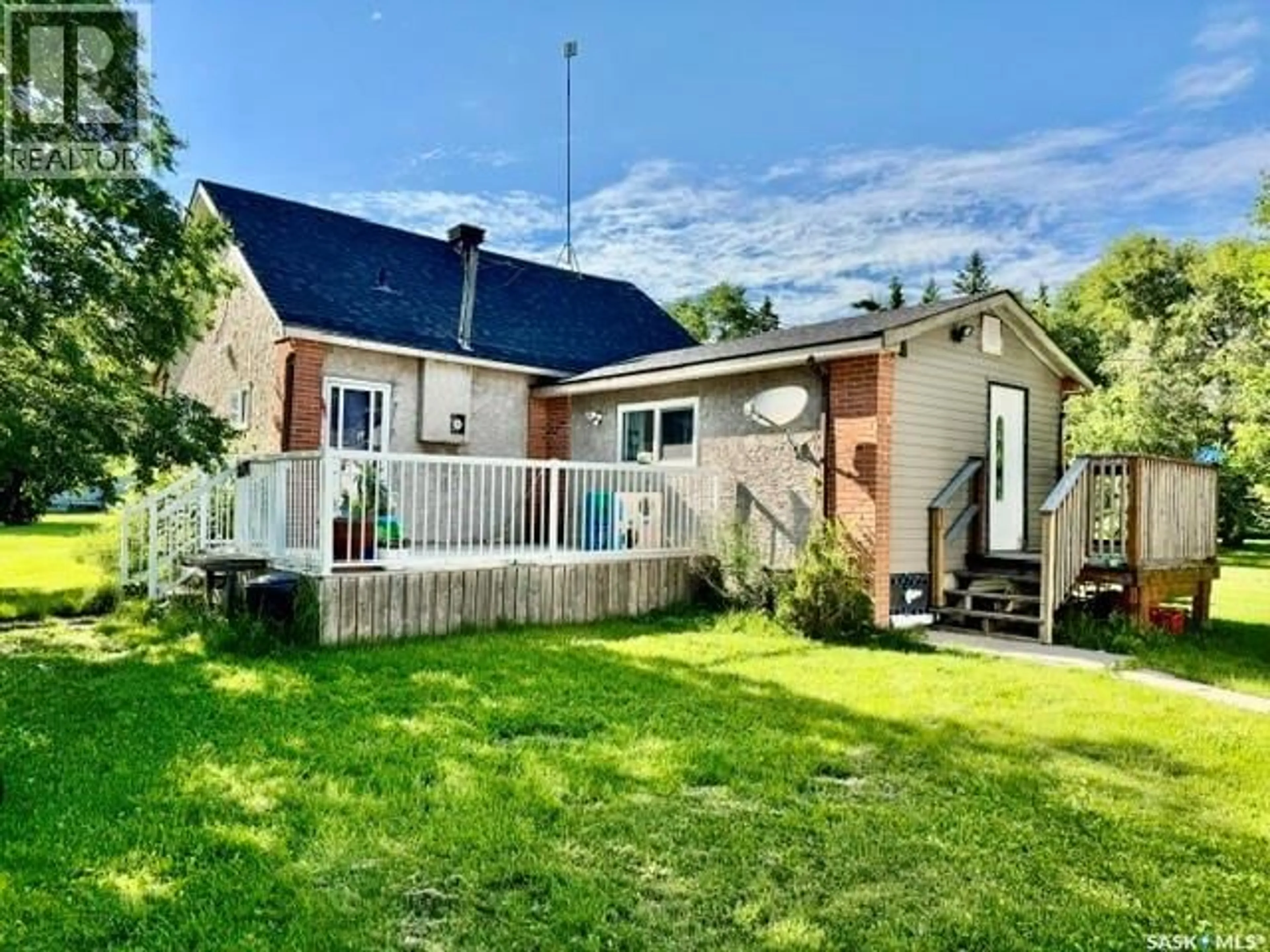 A pic from outside/outdoor area/front of a property/back of a property/a pic from drone, unknown for 213 1ST AVENUE, St. Gregor Saskatchewan S0K3X0