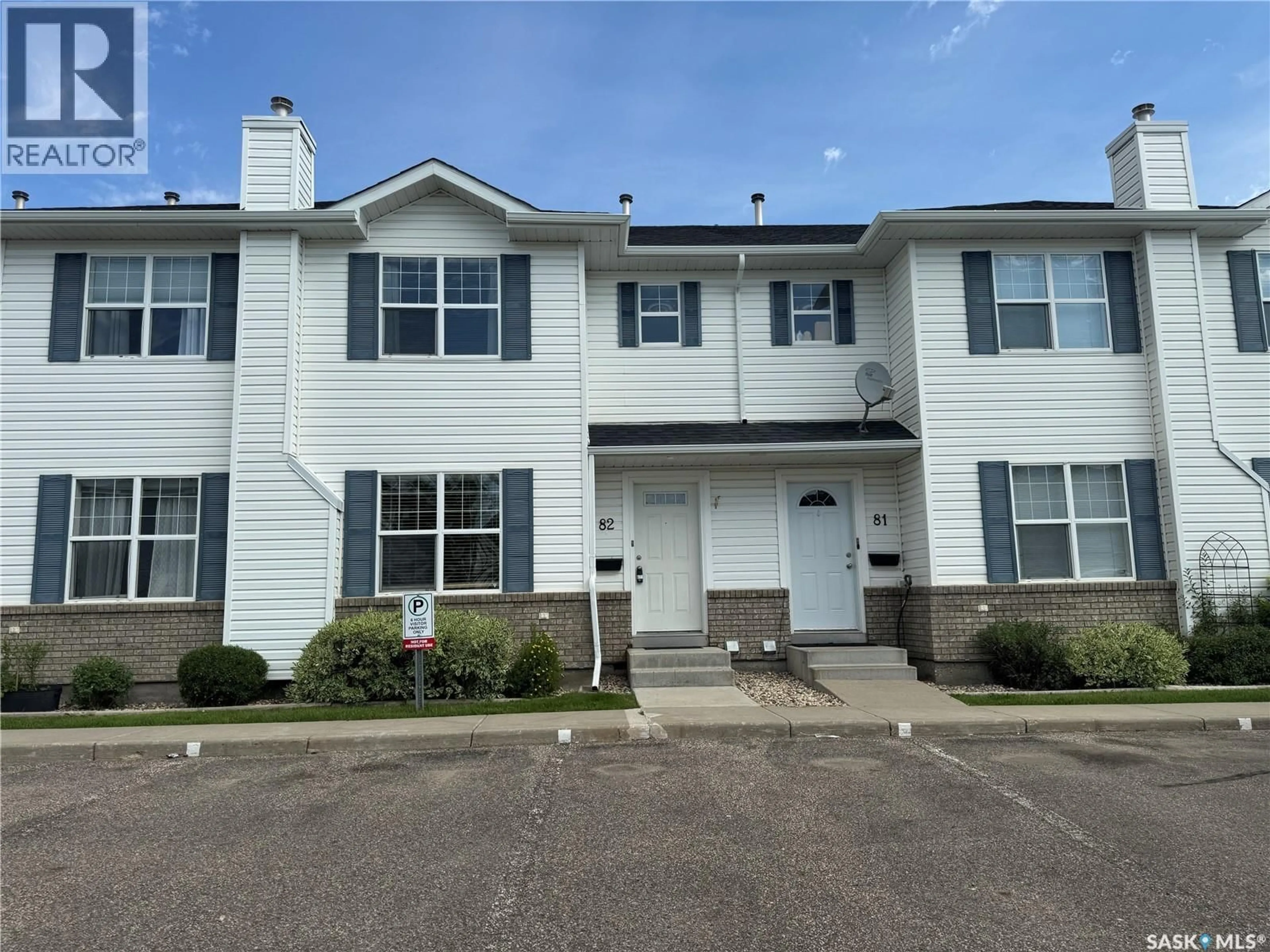 Home with vinyl exterior material, street for 203 - 82 HEROLD TERRACE, Saskatoon Saskatchewan S7V1H5