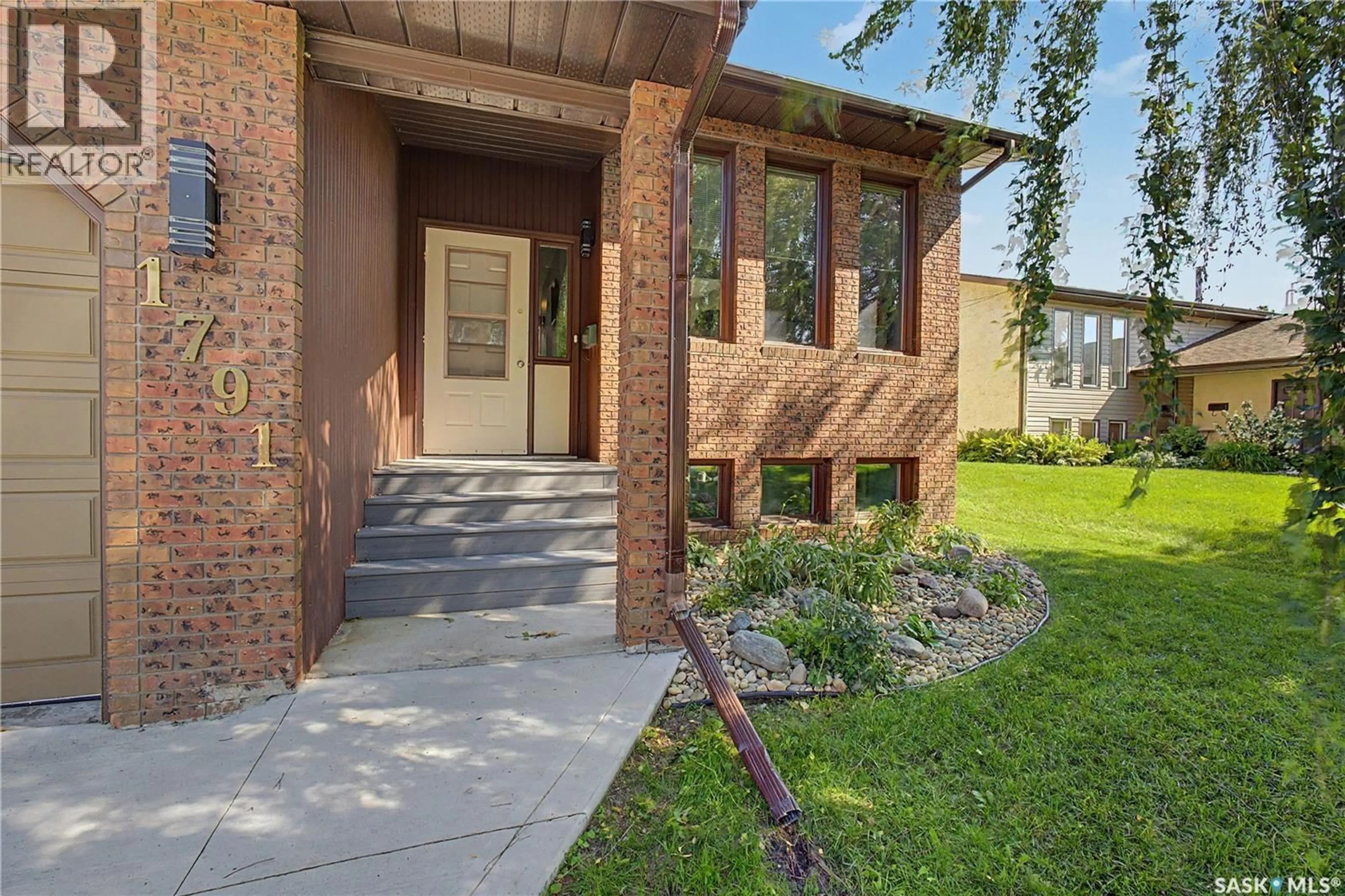 Home with brick exterior material, street for 1791 BARTON DRIVE, Prince Albert Saskatchewan S6V7W1