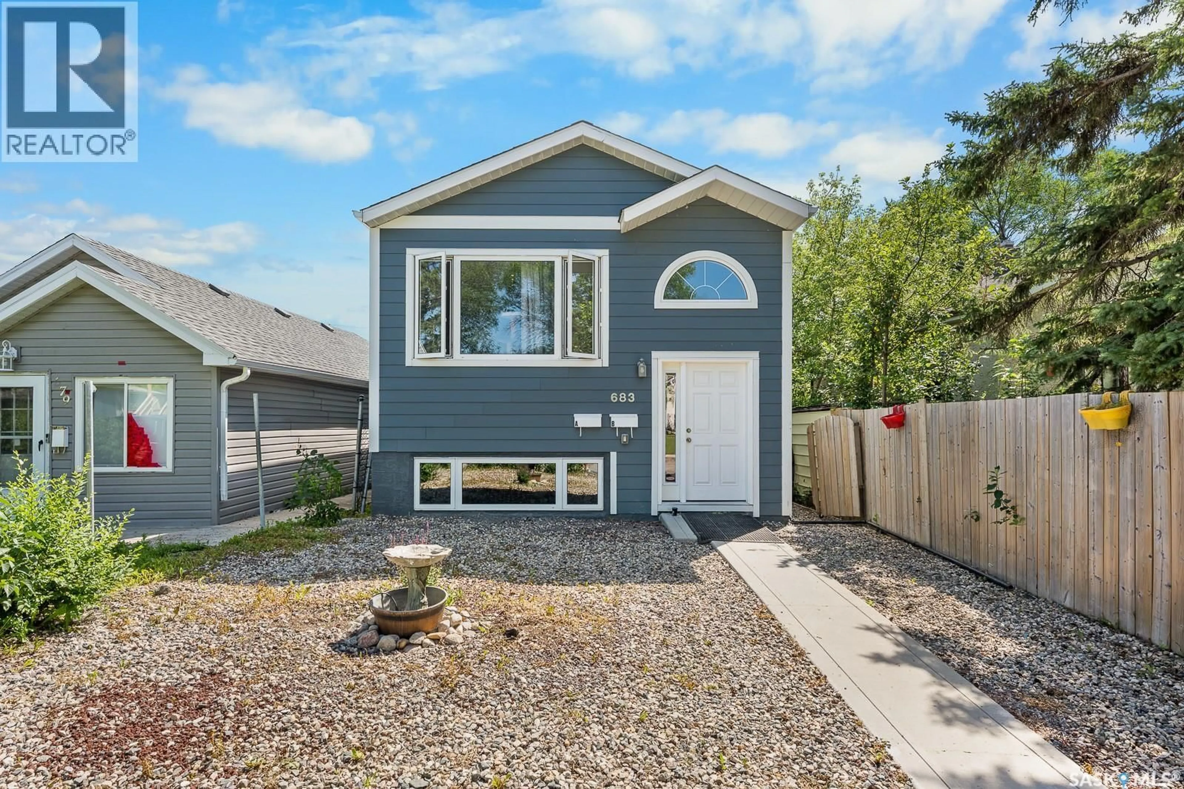 Home with vinyl exterior material, street for A&B - 683 GARNET STREET, Regina Saskatchewan S4T2W9