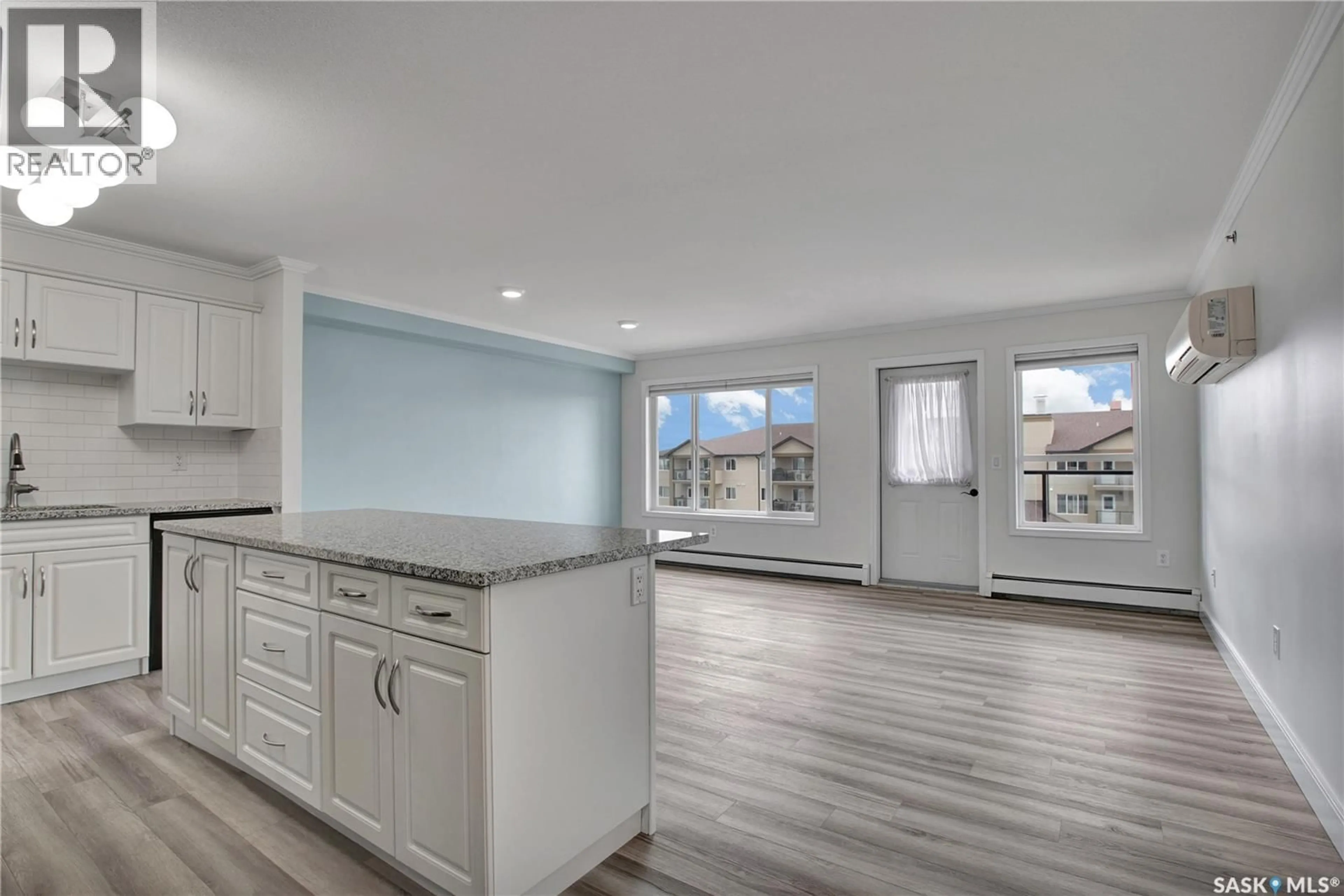 Open concept kitchen, wood/laminate floor for 600 - 405 CENTENNIAL BOULEVARD, Warman Saskatchewan S0K4S1