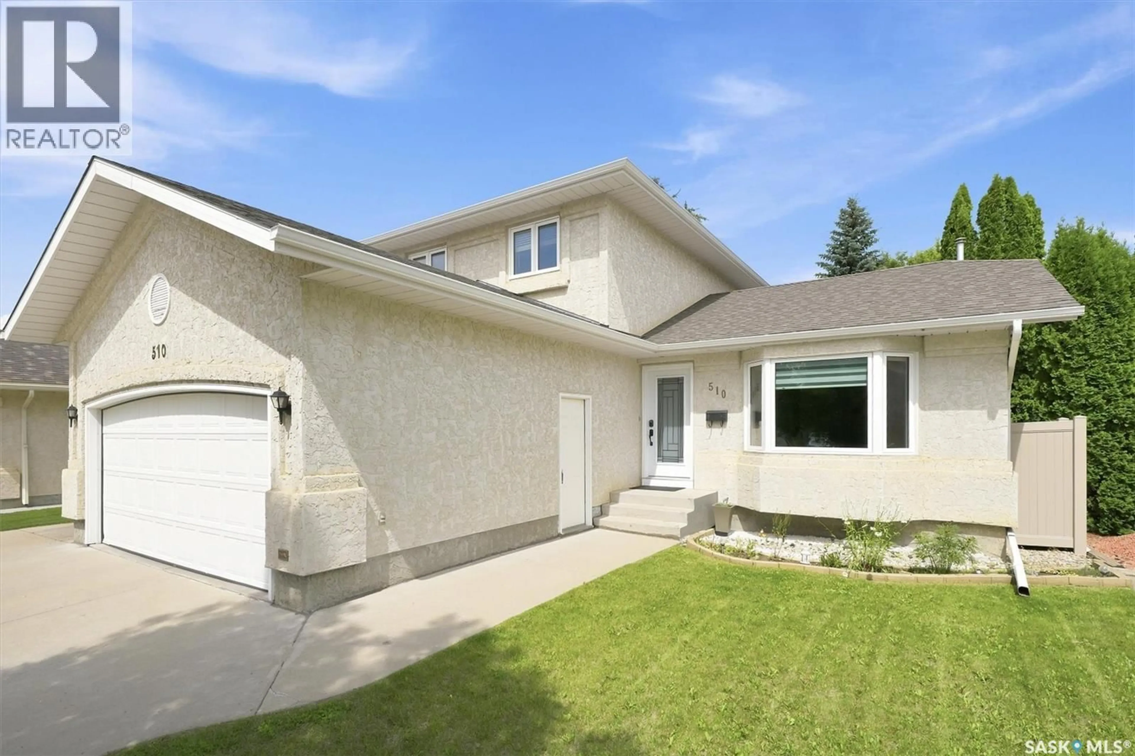 Home with vinyl exterior material, street for 510 STEIGER WAY, Saskatoon Saskatchewan S7N4K2