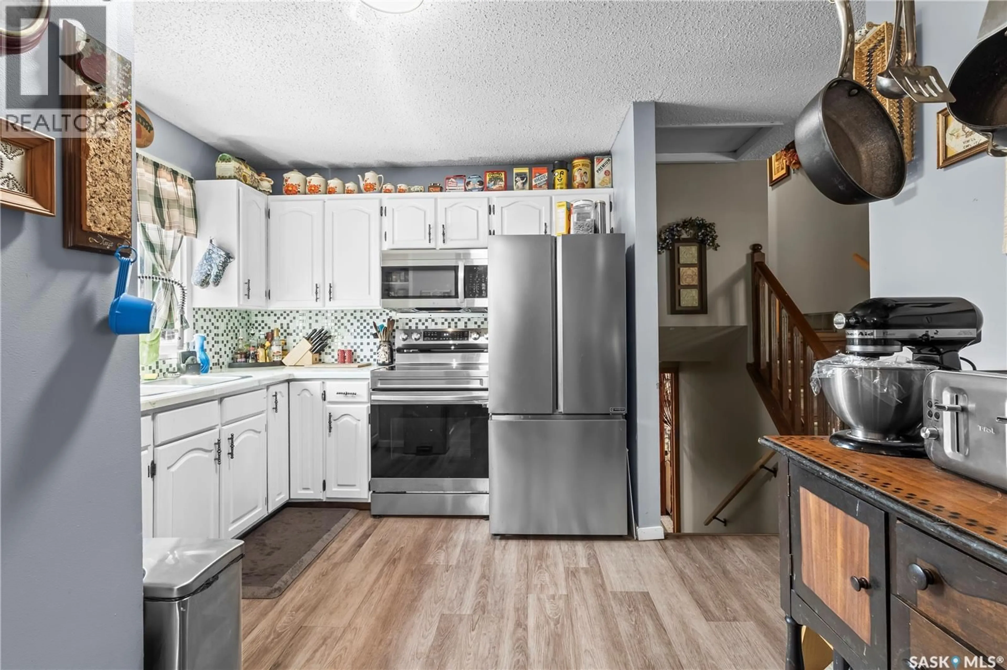 Open concept kitchen, ceramic/tile floor for 2450 15TH AVENUE, Prince Albert Saskatchewan S6V6J1