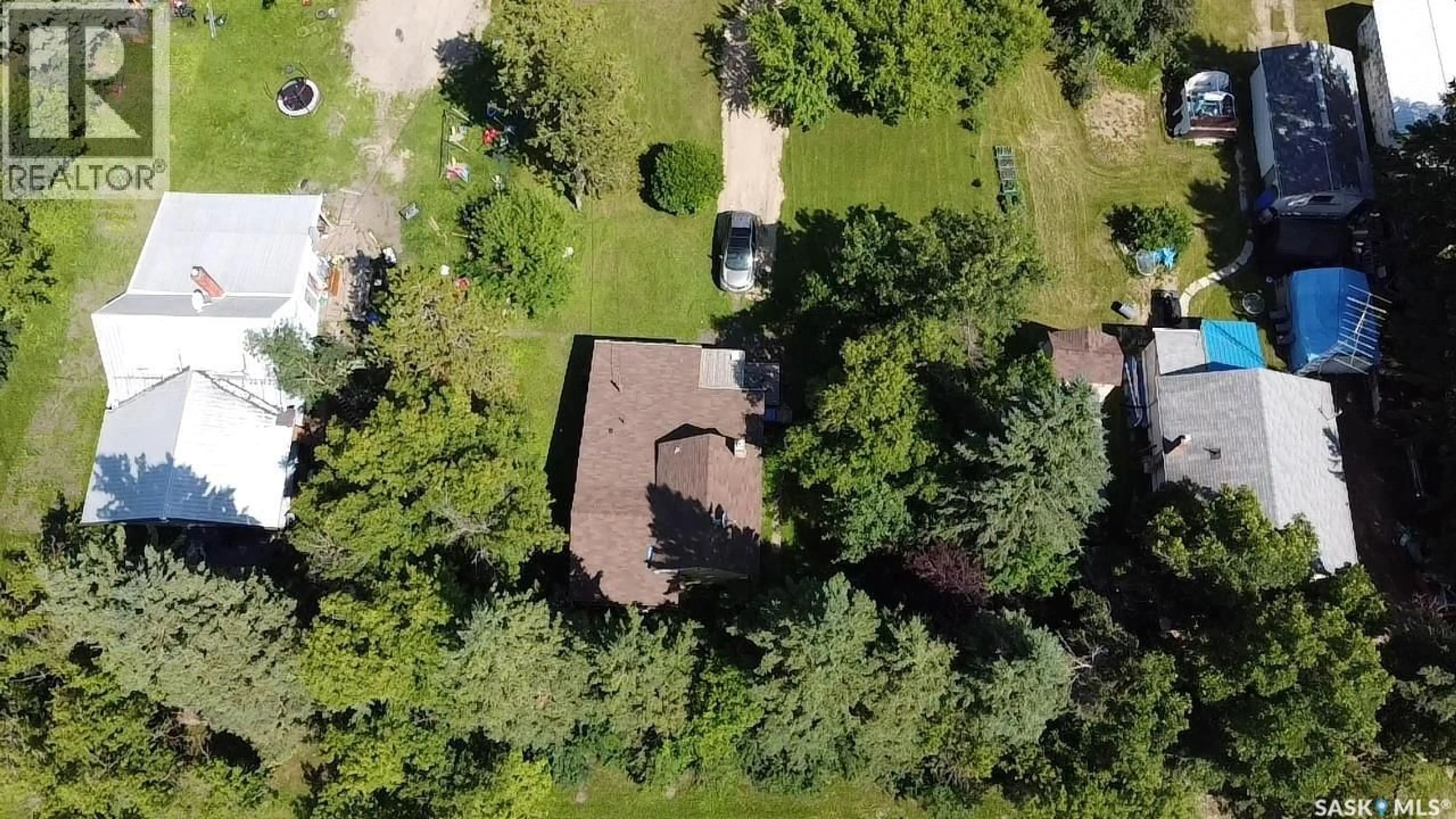 A pic from outside/outdoor area/front of a property/back of a property/a pic from drone, forest/trees view for 120 1ST STREET, Star City Saskatchewan S0E1P0