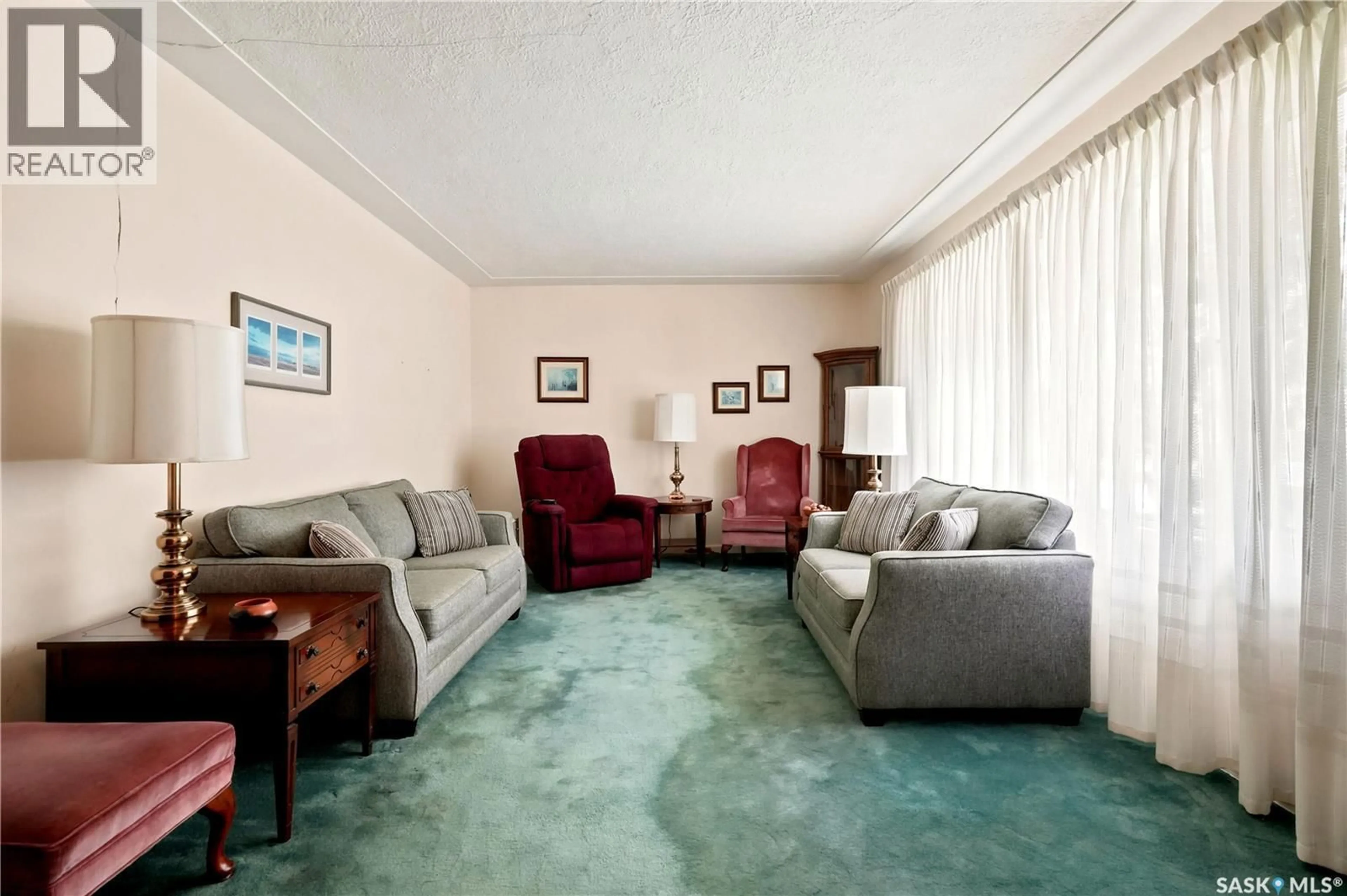 Living room with furniture, carpet floor for 5 LAMONT CRESCENT, Regina Saskatchewan S4S4A3