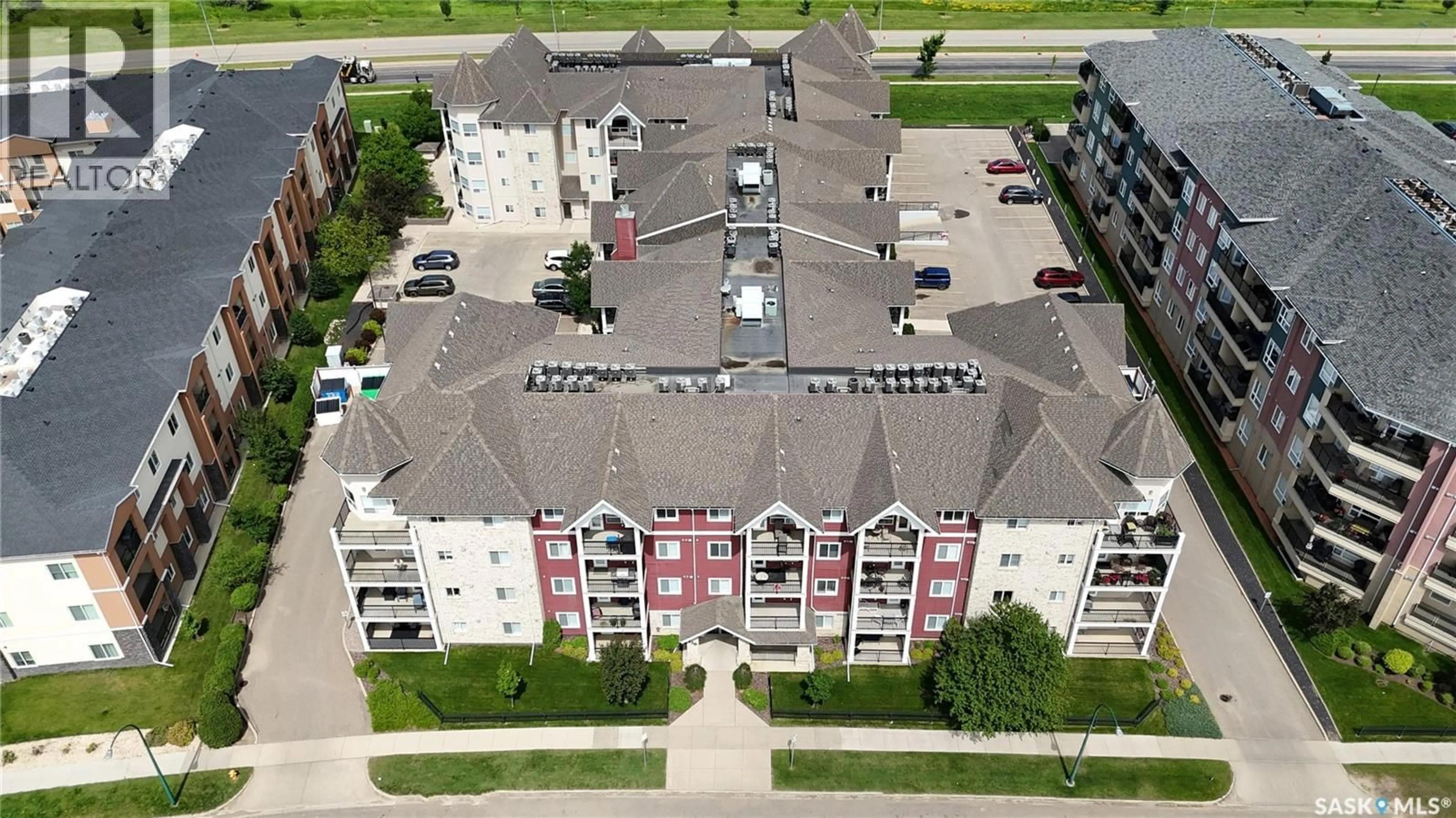 A pic from outside/outdoor area/front of a property/back of a property/a pic from drone, unknown for 404 150 PAWLYCHENKO LANE, Saskatoon Saskatchewan S7V0B4