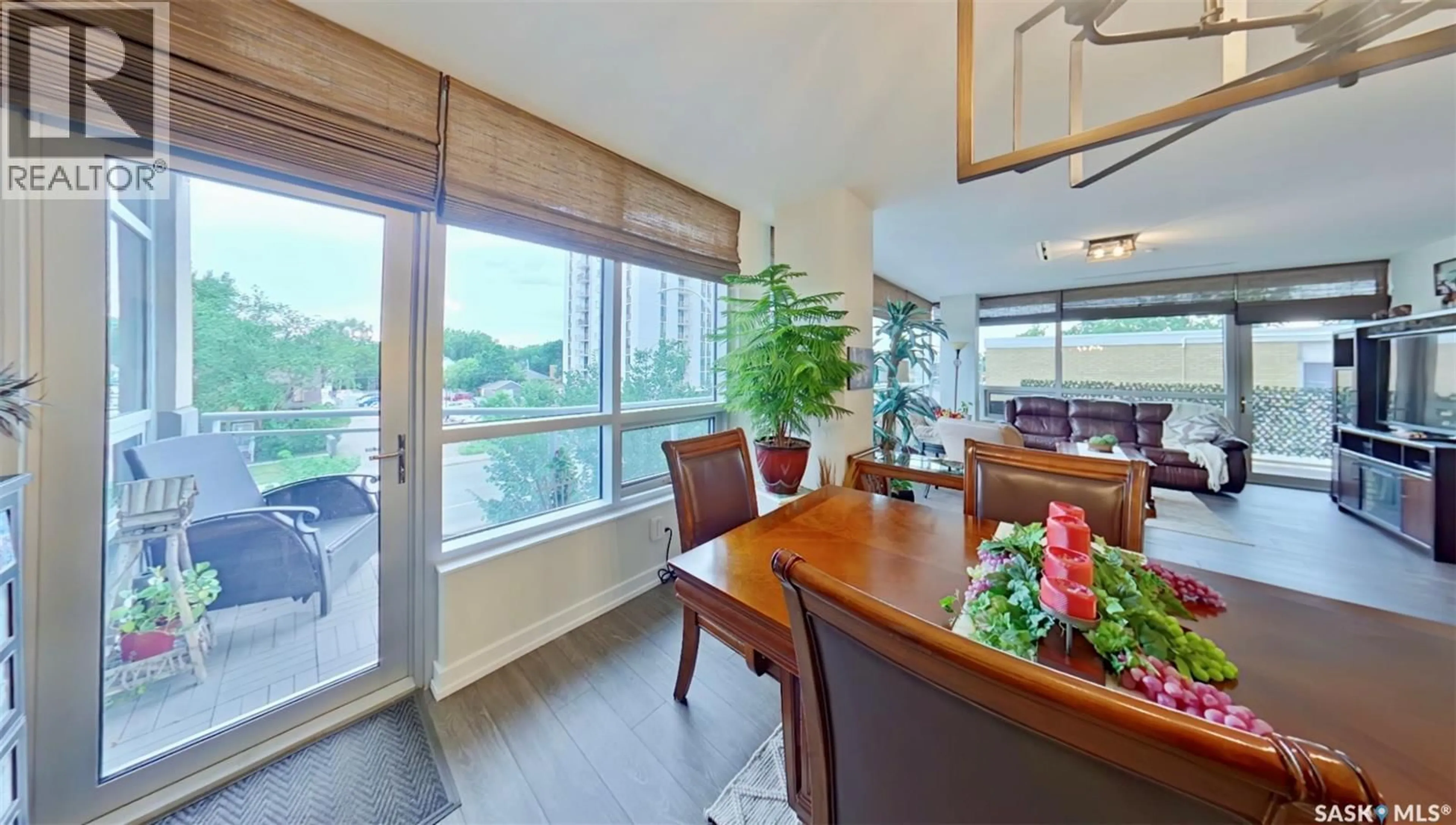 Dining room, wood/laminate floor for 204 - 2300 BROAD STREET, Regina Saskatchewan S4P1Y8