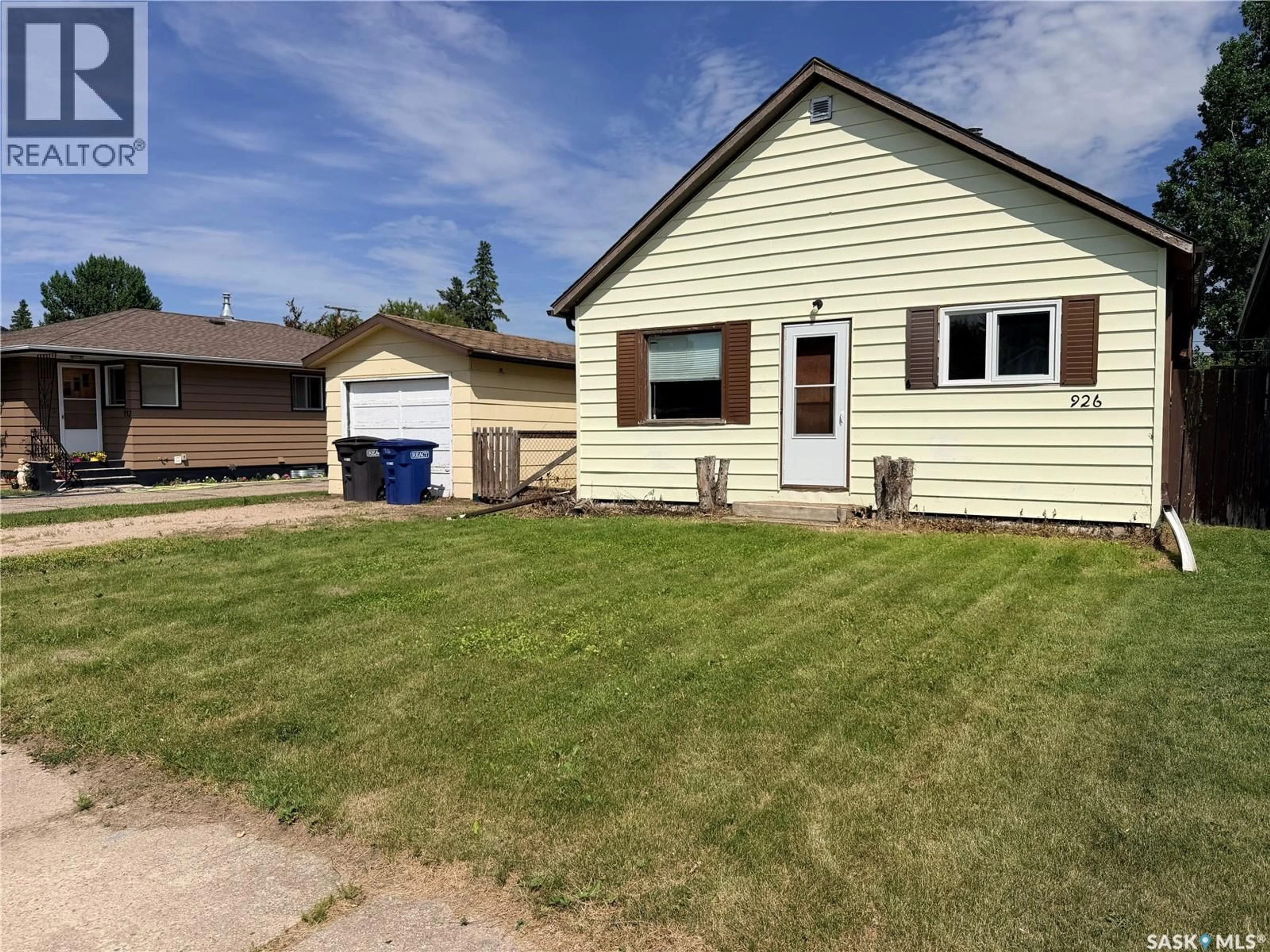 Home with vinyl exterior material, street for 926 12TH STREET, Humboldt Saskatchewan S0K2A0