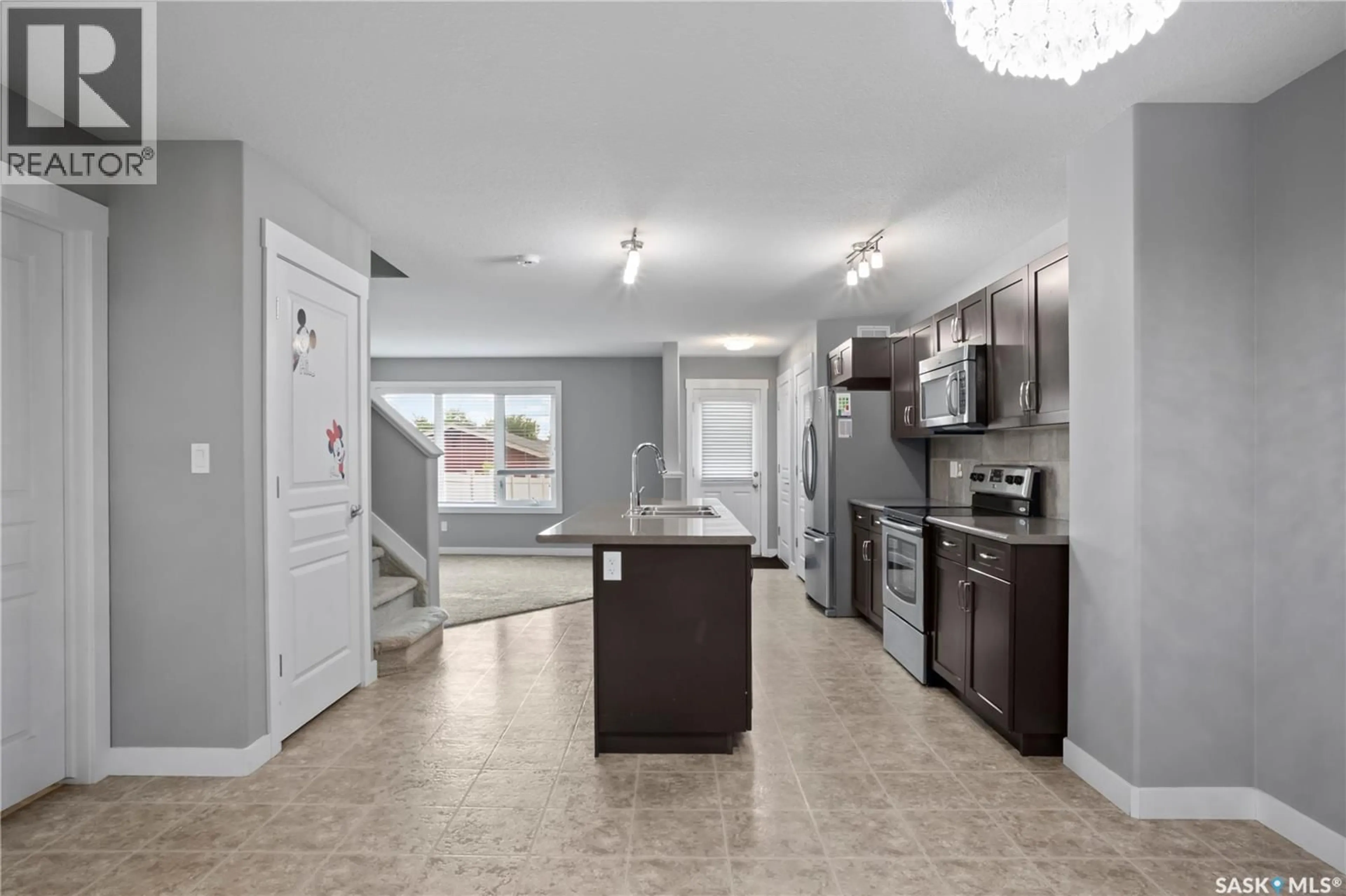 Open concept kitchen, ceramic/tile floor for 4406 GREEN OLIVE WAY, Regina Saskatchewan S4V3H5